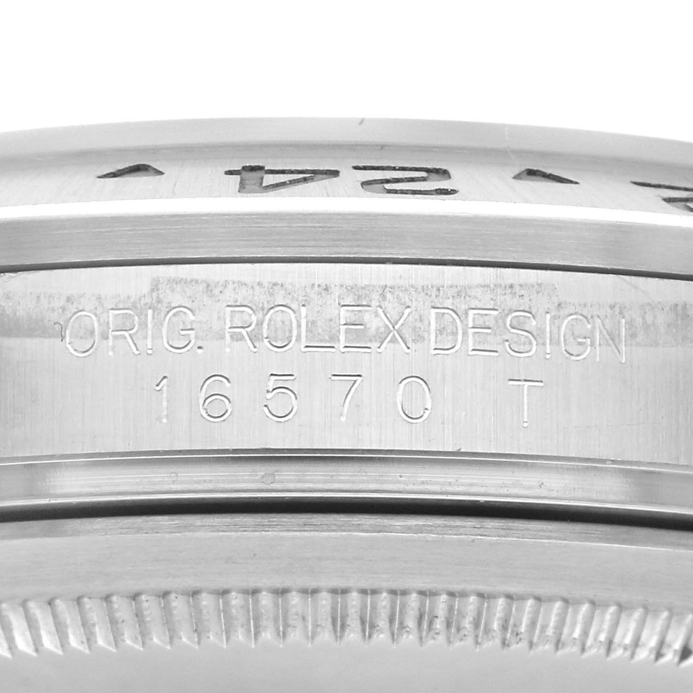 The image shows a close-up side angle of the Rolex Explorer 16570T Men's Stainless Steel Black Dial 16570T Men's Stainless Steel Black Dial watch's case, highlighting the engraved design and model number.
