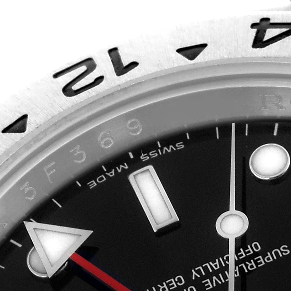 The image shows a close-up of the Rolex Explorer 16570T Men's Stainless Steel Black Dial 16570T Men's Stainless Steel Black Dial watch face, highlighting the bezel, hour markers, and hands.
