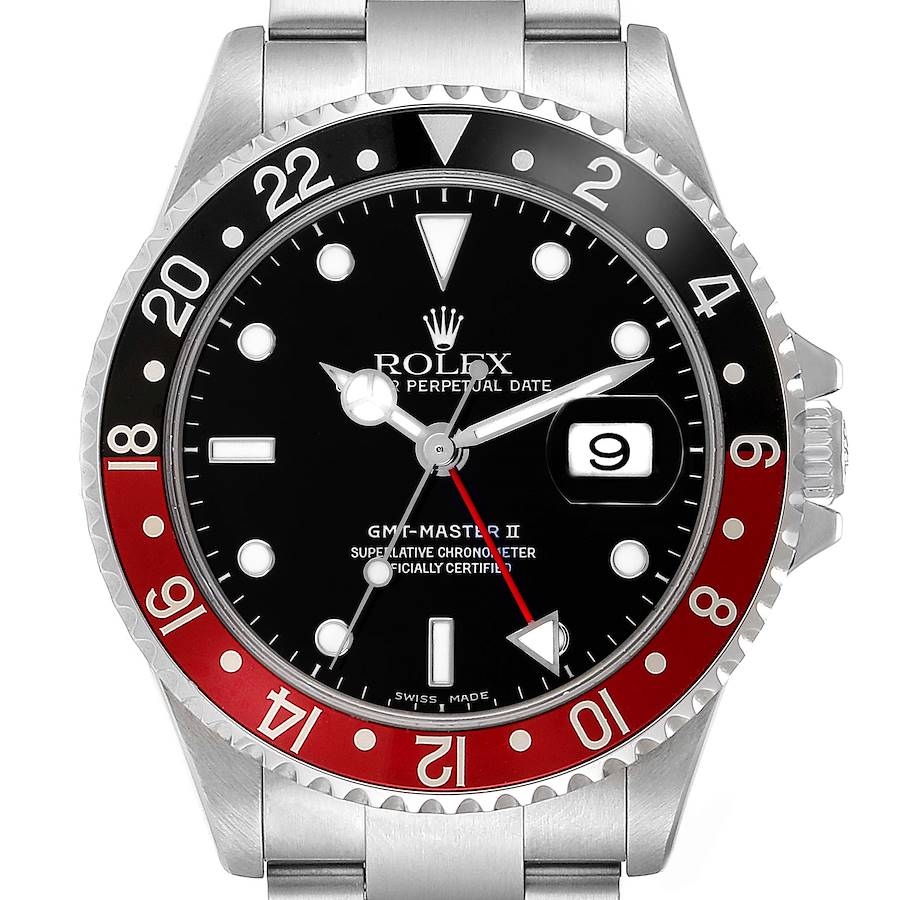 The Rolex GMT-Master watch is shown from the front, displaying the bezel, dial, hands, and date magnifier.