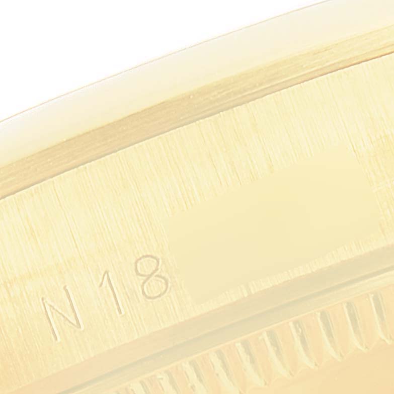 The close-up image shows the side and edge of the bezel and case of a Rolex President 67488 Women
s Yellow Gold White Dial 67488 Women
s Yellow Gold White Dial model watch.