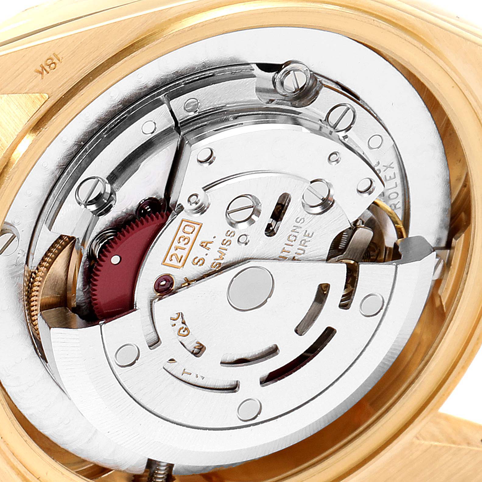 The image shows the intricate internal mechanism of the Rolex President 67488 Women
s Yellow Gold White Dial 67488 Women
s Yellow Gold White Dial model watch at a close-up angle.