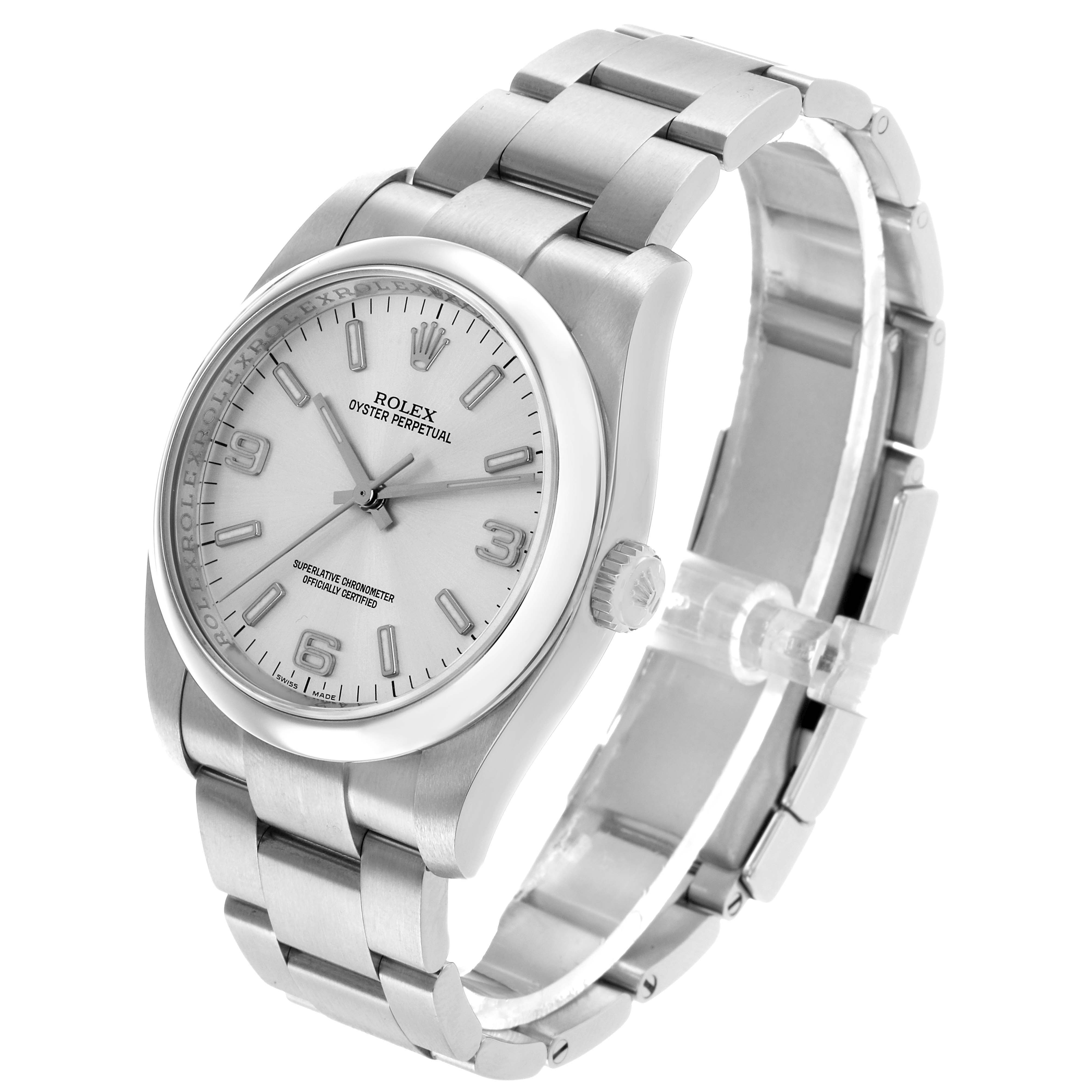 The Rolex Oyster Perpetual 116000 Men's Stainless Steel Silver Dial watch is shown at a three-quarter angle, highlighting the face, bezel, crown, and bracelet.