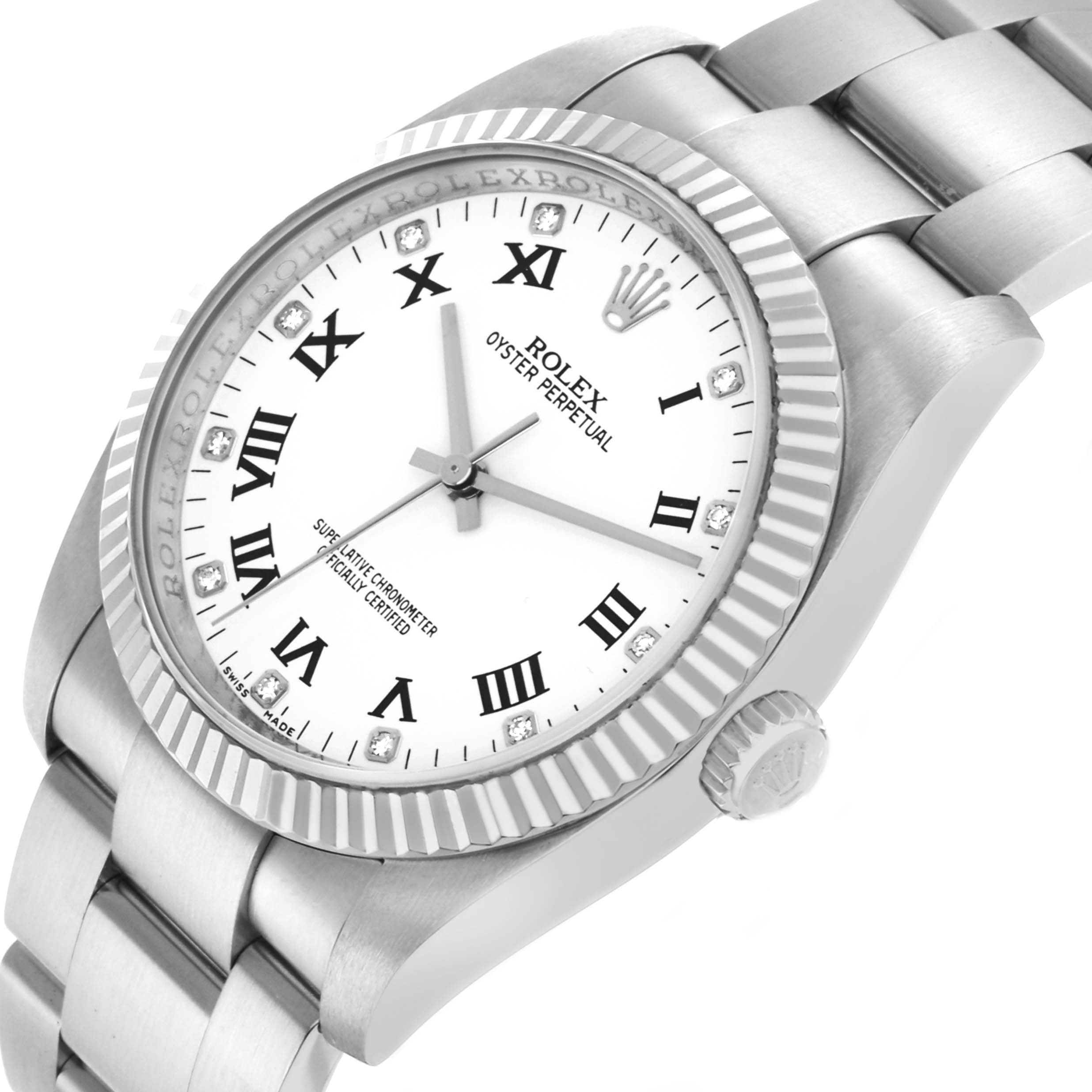 The Rolex Oyster Perpetual 116034 Men's Stainless Steel White Dial watch is shown at an angle highlighting the face, bezel, and partial bracelet.