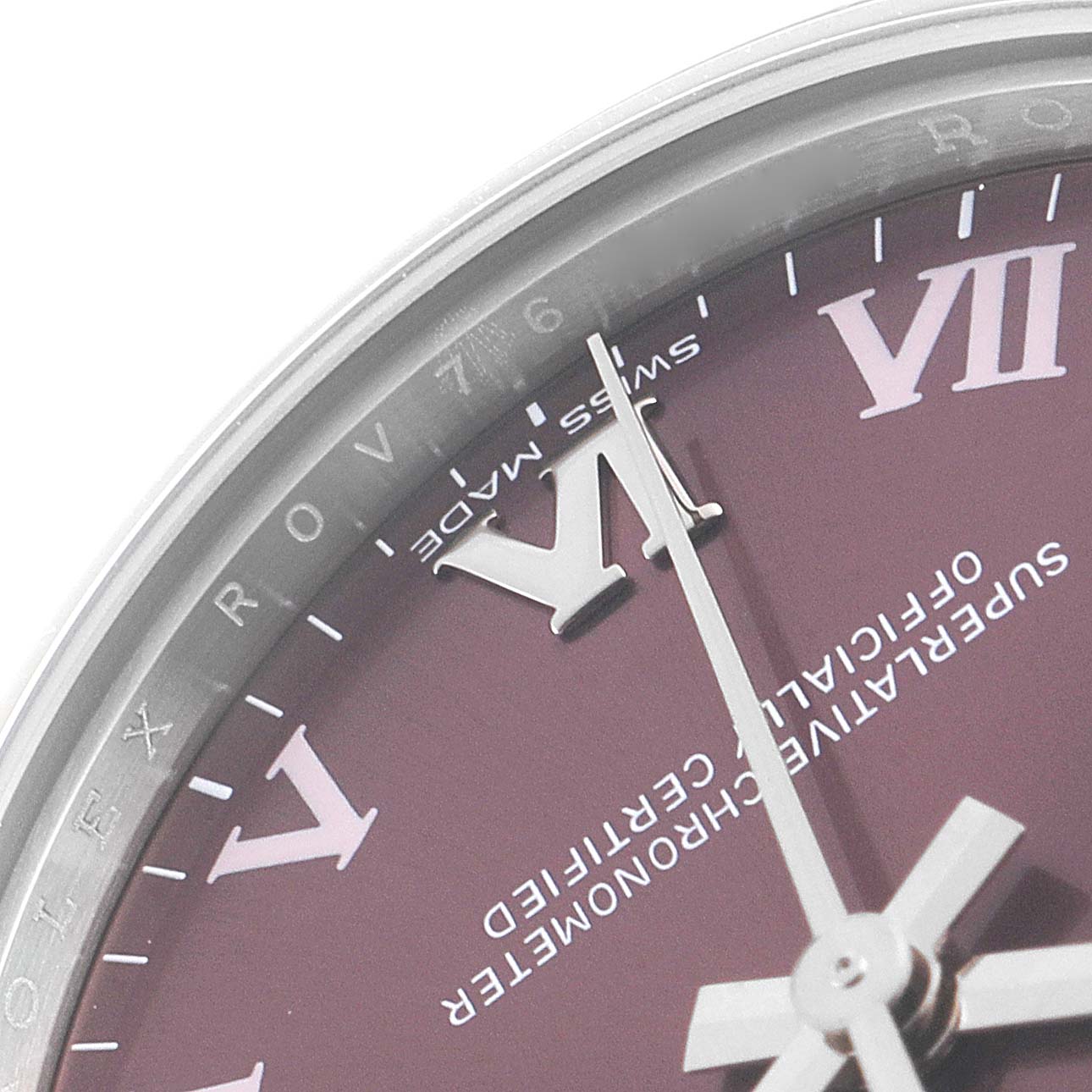 The image shows a close-up of the dial and the second-hand of a mid-size Rolex watch.