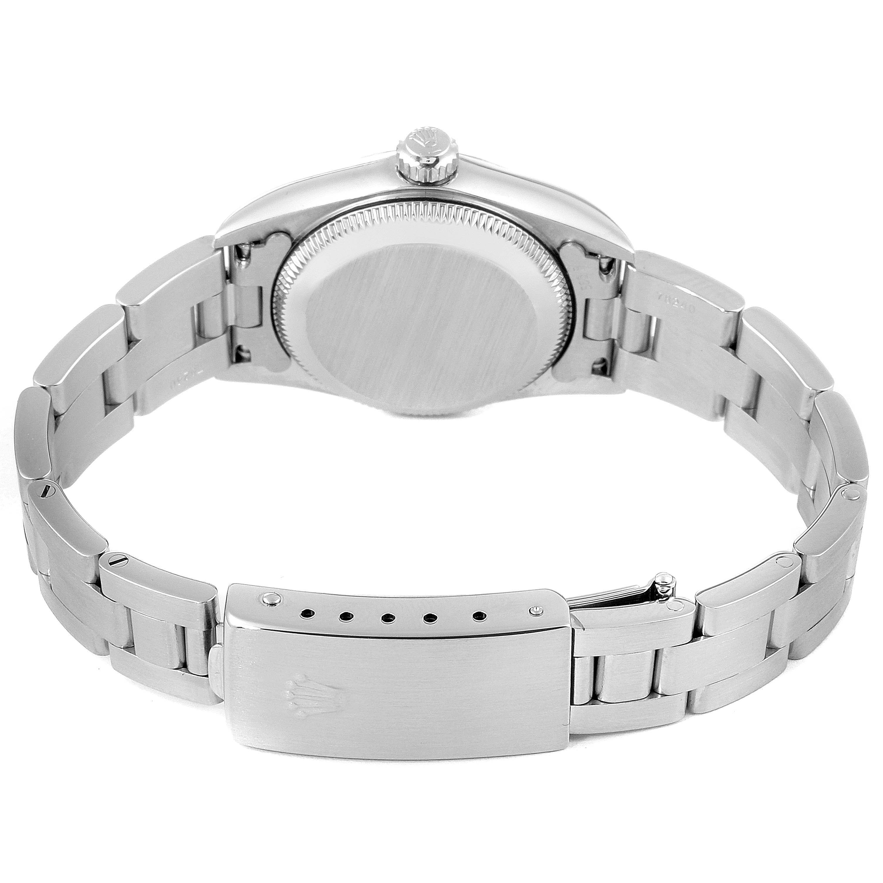 The image shows the back view of the Rolex Oyster Perpetual 76080 Women's Stainless Steel Silver Dial 76080 Women's Stainless Steel Silver Dial, focusing on the case back, crown, and bracelet with the clasp.