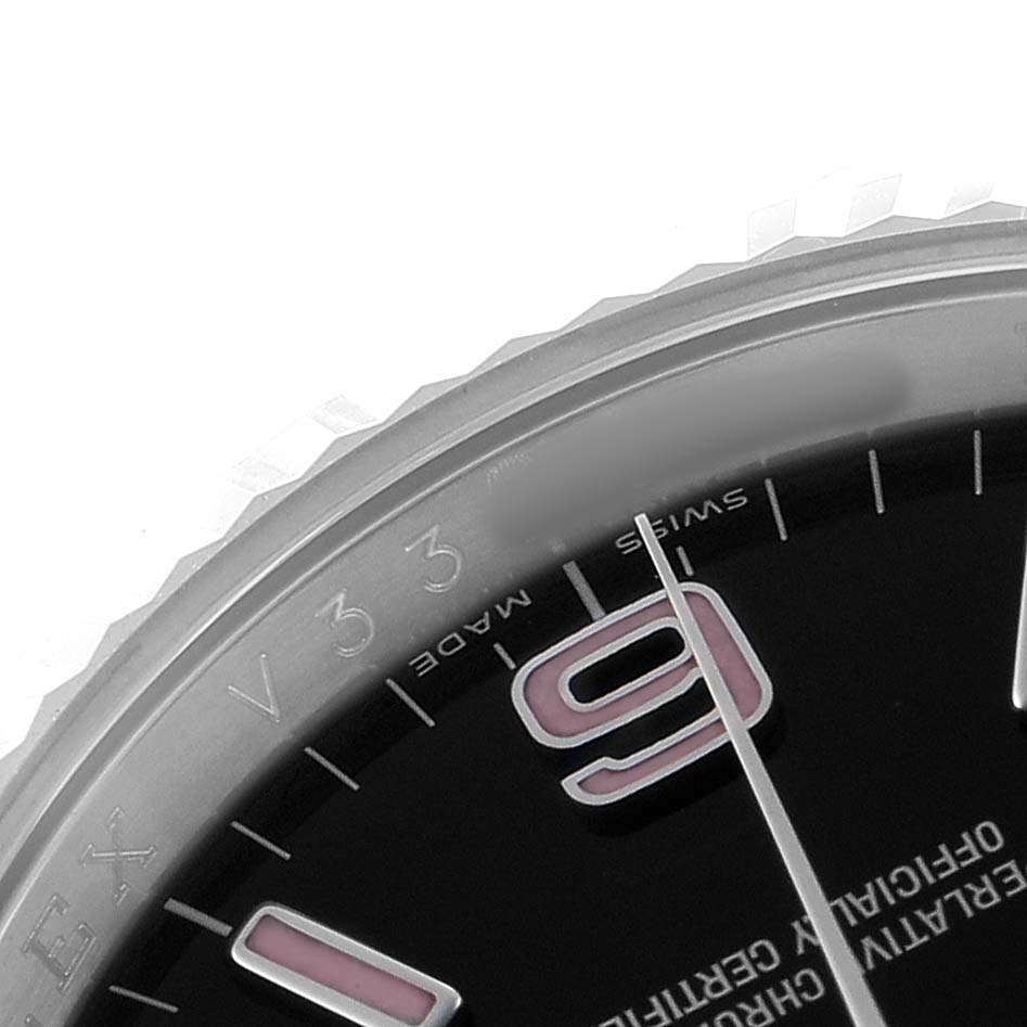 The image shows a close-up of the Rolex Oyster Perpetual 116034 Men's Stainless Steel Black Dial's bezel, dial edge, and part of the hour marker and hands.