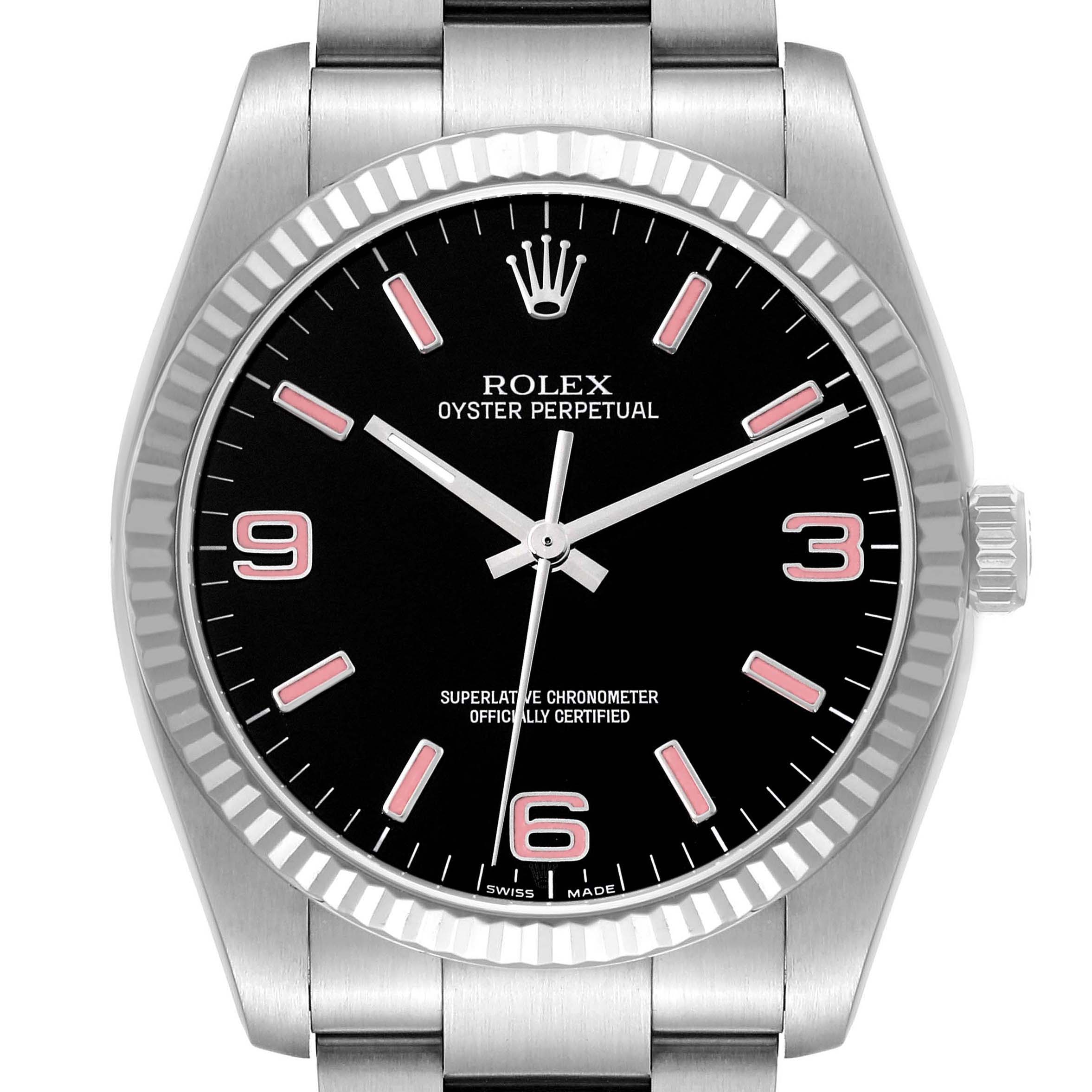 The Rolex Oyster Perpetual 116034 Men's Stainless Steel Black Dial watch is shown from a front angle, displaying the dial, bezel, and part of the bracelet.