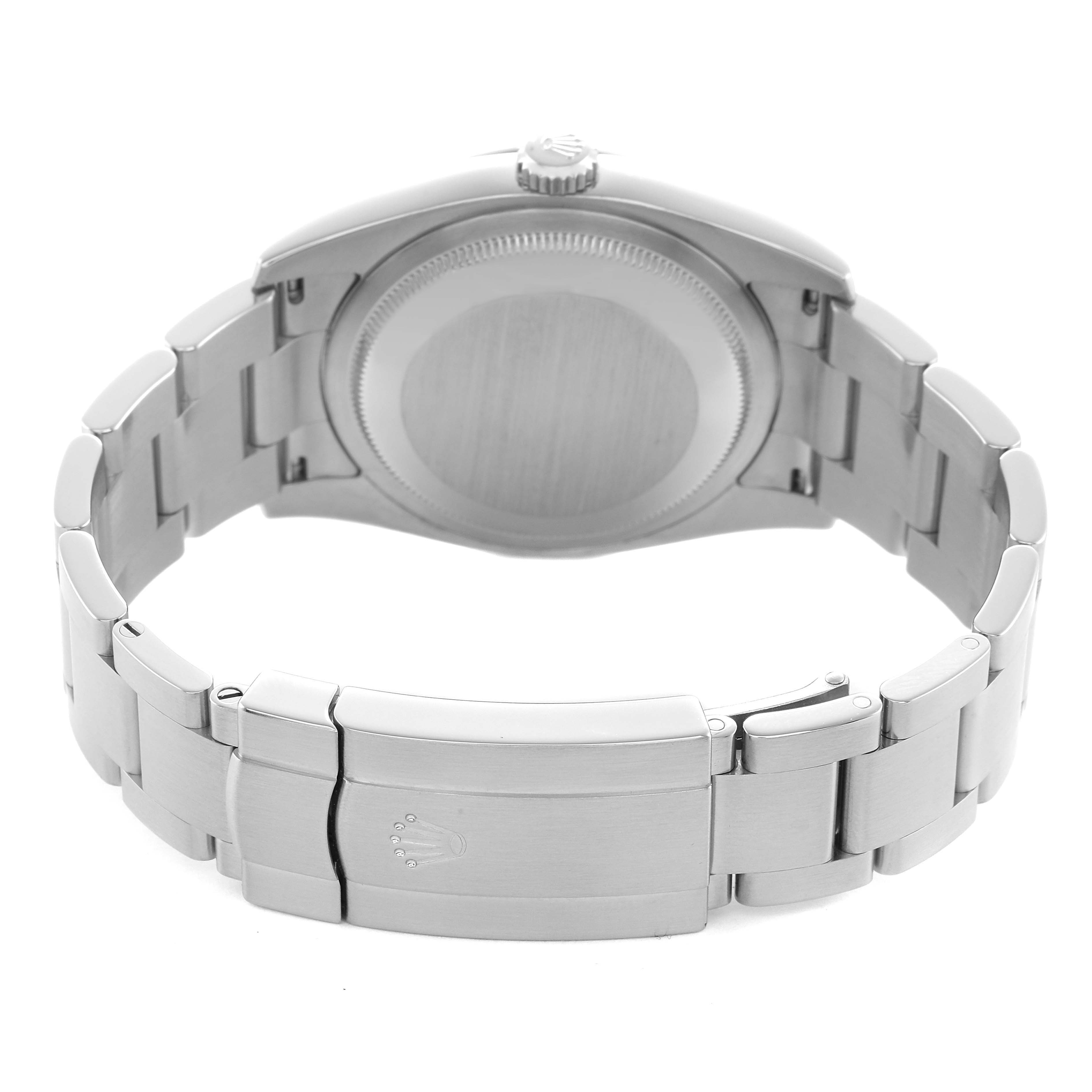 The image shows the back of the Rolex Oyster Perpetual 116034 Men's Stainless Steel Black Dial watch, highlighting the case back and bracelet clasp.