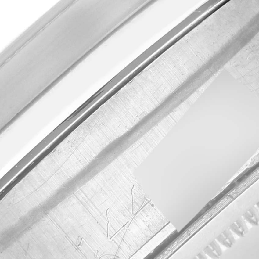 This image shows a close-up of the metal bracelet links of a Rolex Vintage Collection 6694 Men's Stainless Steel Black Dial 6694 Men's Stainless Steel Black Dial watch.