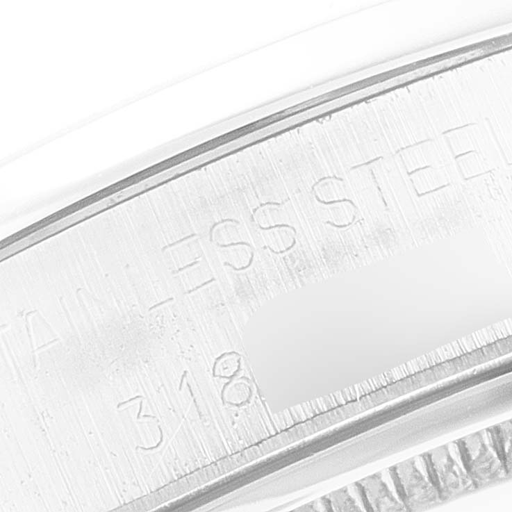 This close-up angle shows the case back engraving details of the Rolex Vintage Collection 6694 Men's Stainless Steel Silver Dial 6694 Men's Stainless Steel Silver Dial watch.
