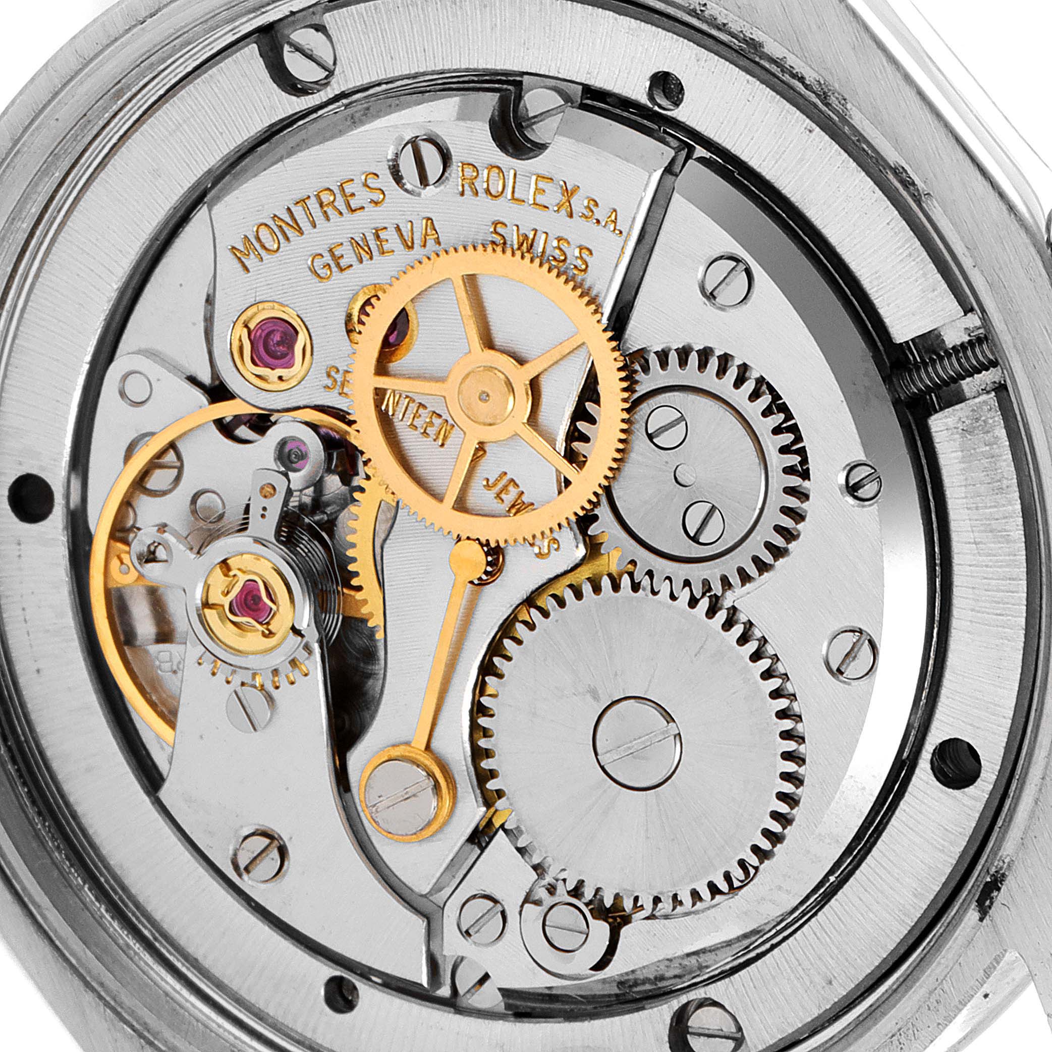 The image shows a close-up view of the interior mechanical components of a Rolex Vintage Collection 6694 Men's Stainless Steel Silver Dial 6694 Men's Stainless Steel Silver Dial watch.