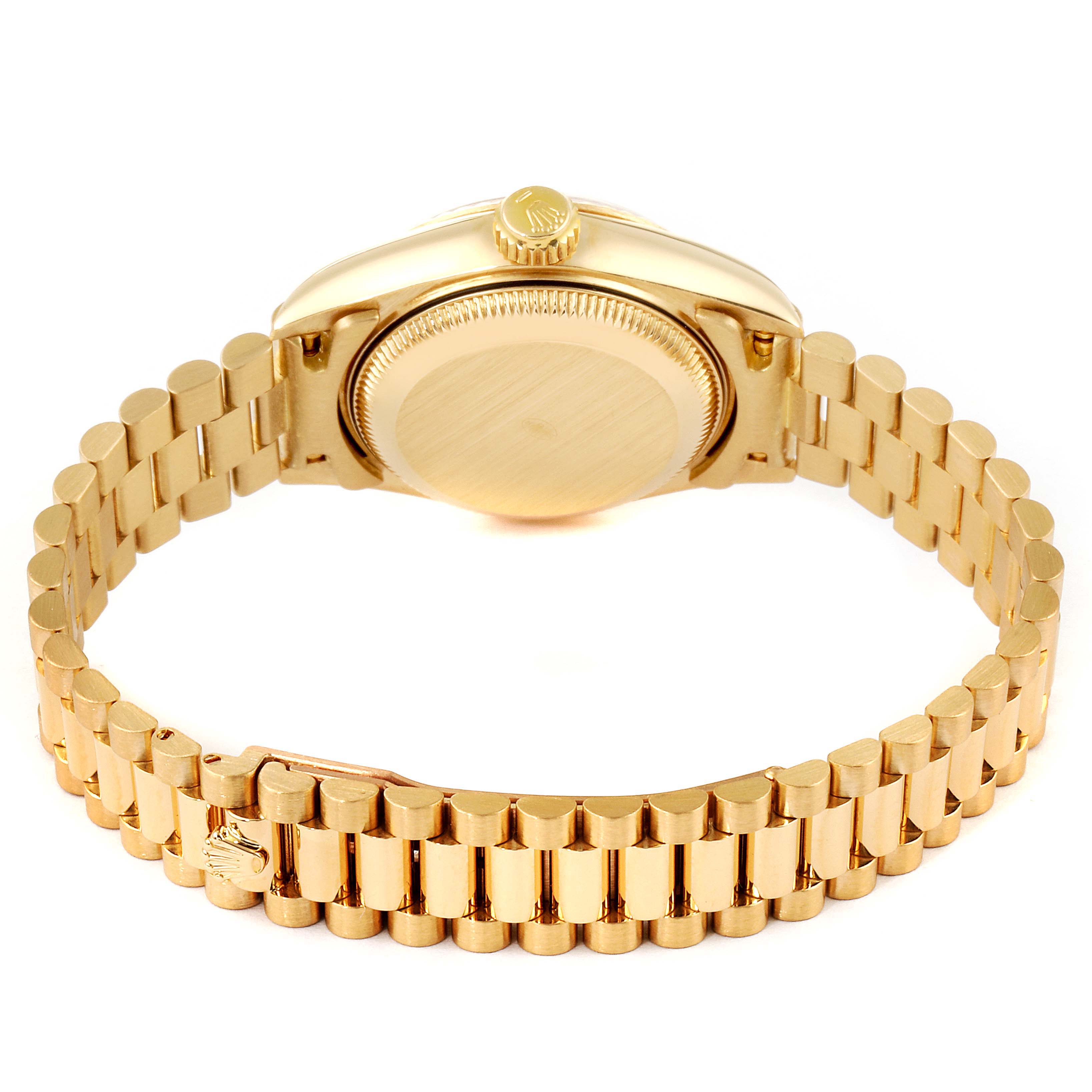 The image shows the backside and bracelet of a Rolex President 69178 Women
s Yellow Gold Champagne Dial 69178 Women
s Yellow Gold Champagne Dial model watch with a gold finish.