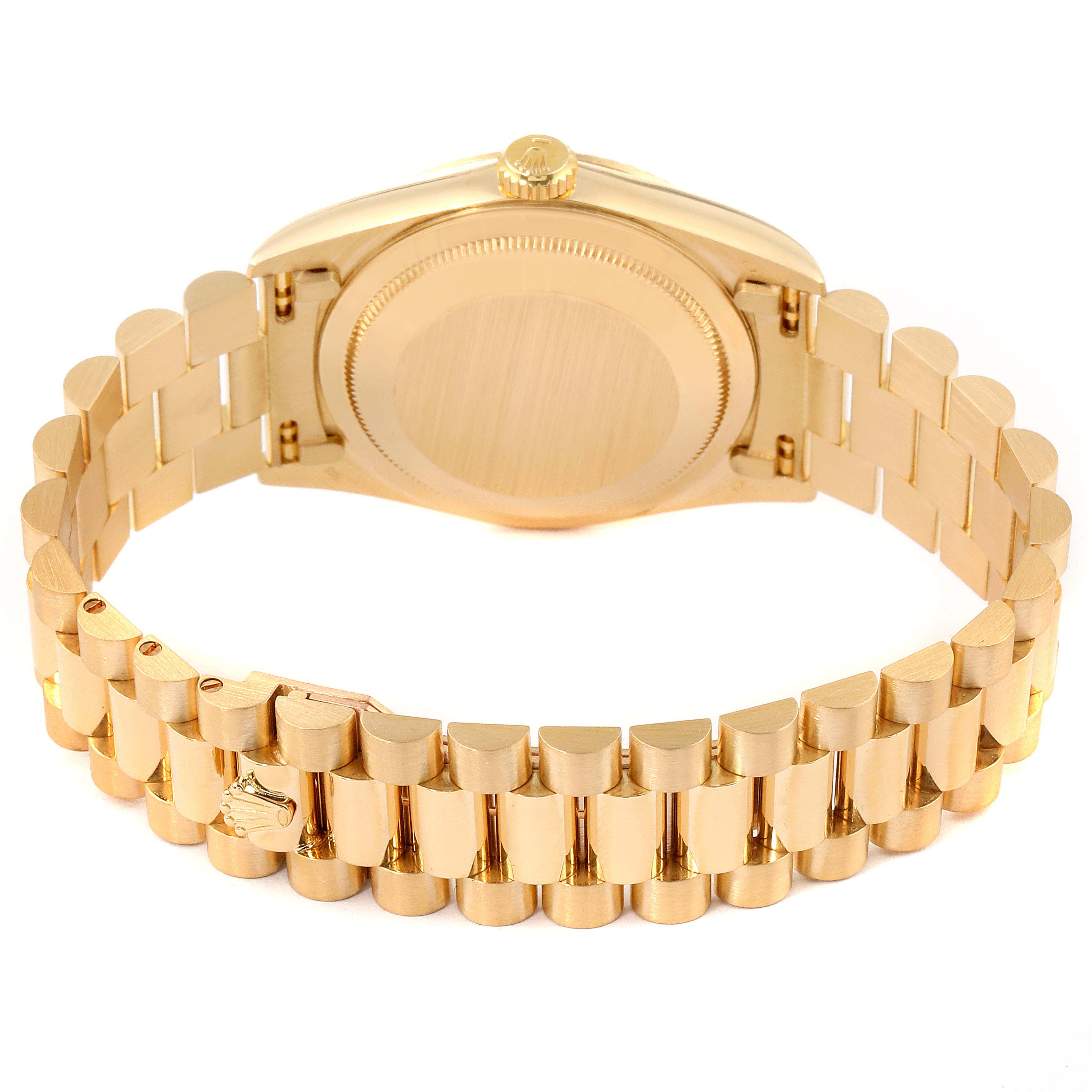 The image shows the backside and the bracelet of a Rolex President 18238 Men's Yellow Gold Champagne Dial 18238 Men's Yellow Gold Champagne Dial model watch.