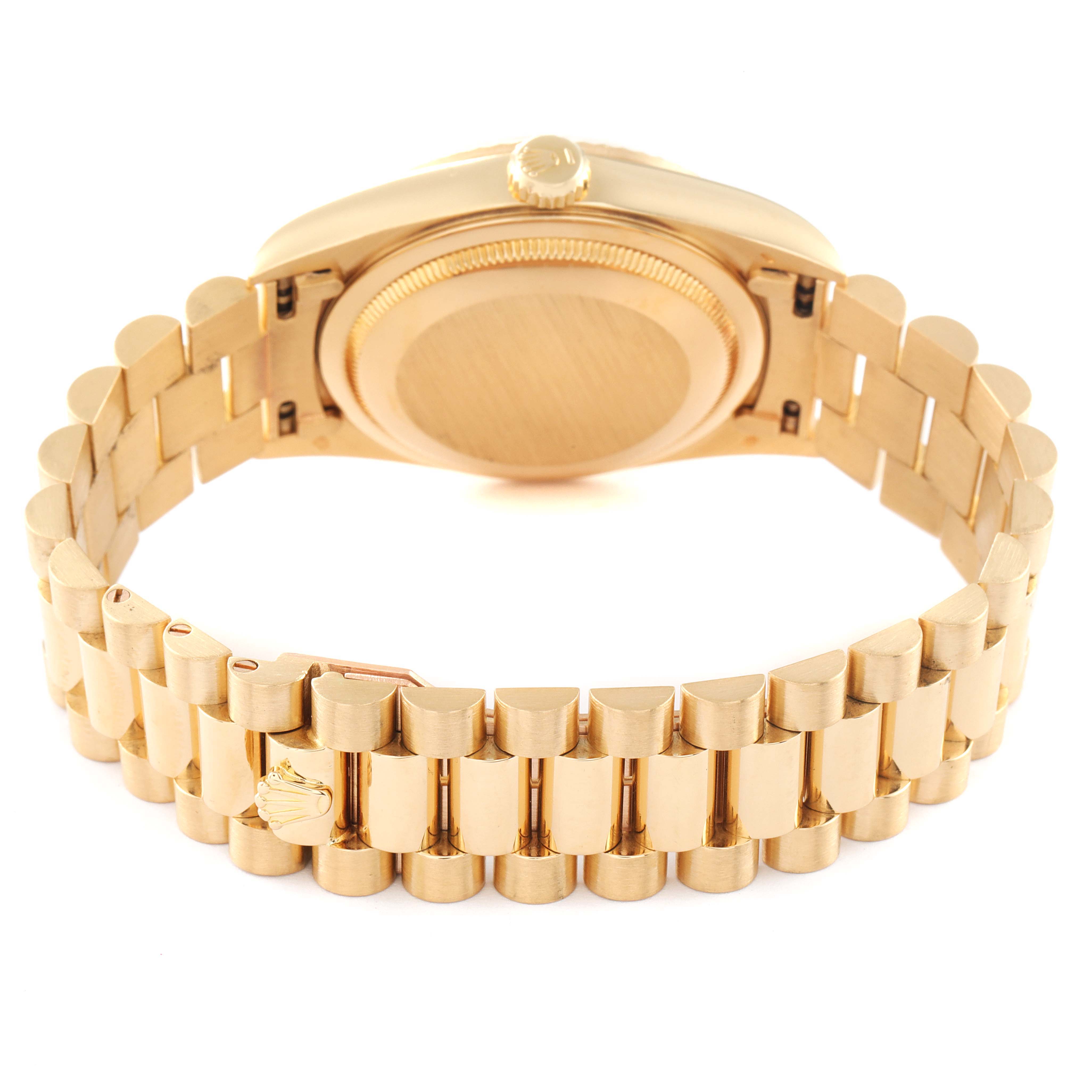 This image shows the back angle of a Rolex President 18238 Men's Yellow Gold Champagne Dial 18238 Men's Yellow Gold Champagne Dial model watch, highlighting its gold bracelet and clasp.