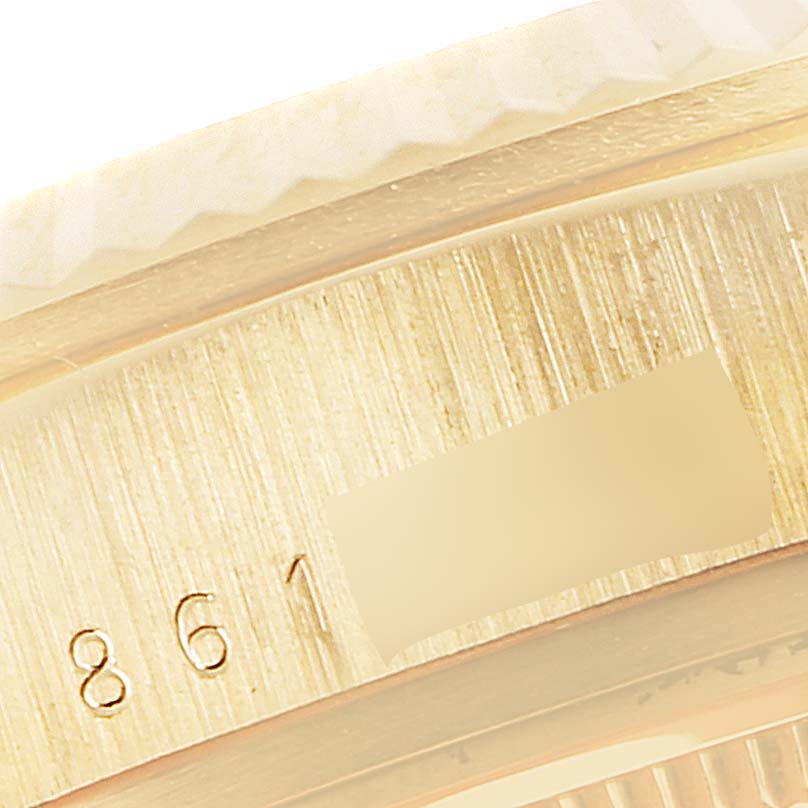 This image shows a close-up view of the bezel and case side of a Rolex President 18038 Men
s Yellow Gold Champagne Dial 18038 Men
s Yellow Gold Champagne Dial model watch.
