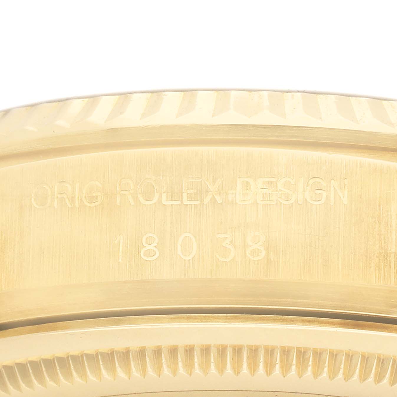 The image shows a close-up of the side of a Rolex President 18038 Men's Yellow Gold Champagne Dial model, highlighting its gold casing and design details.