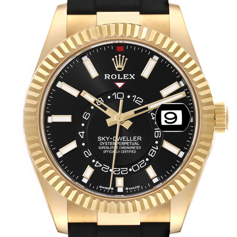 The Rolex Sky-Dweller is shown from a front angle, displaying the dial, bezel, and crown.