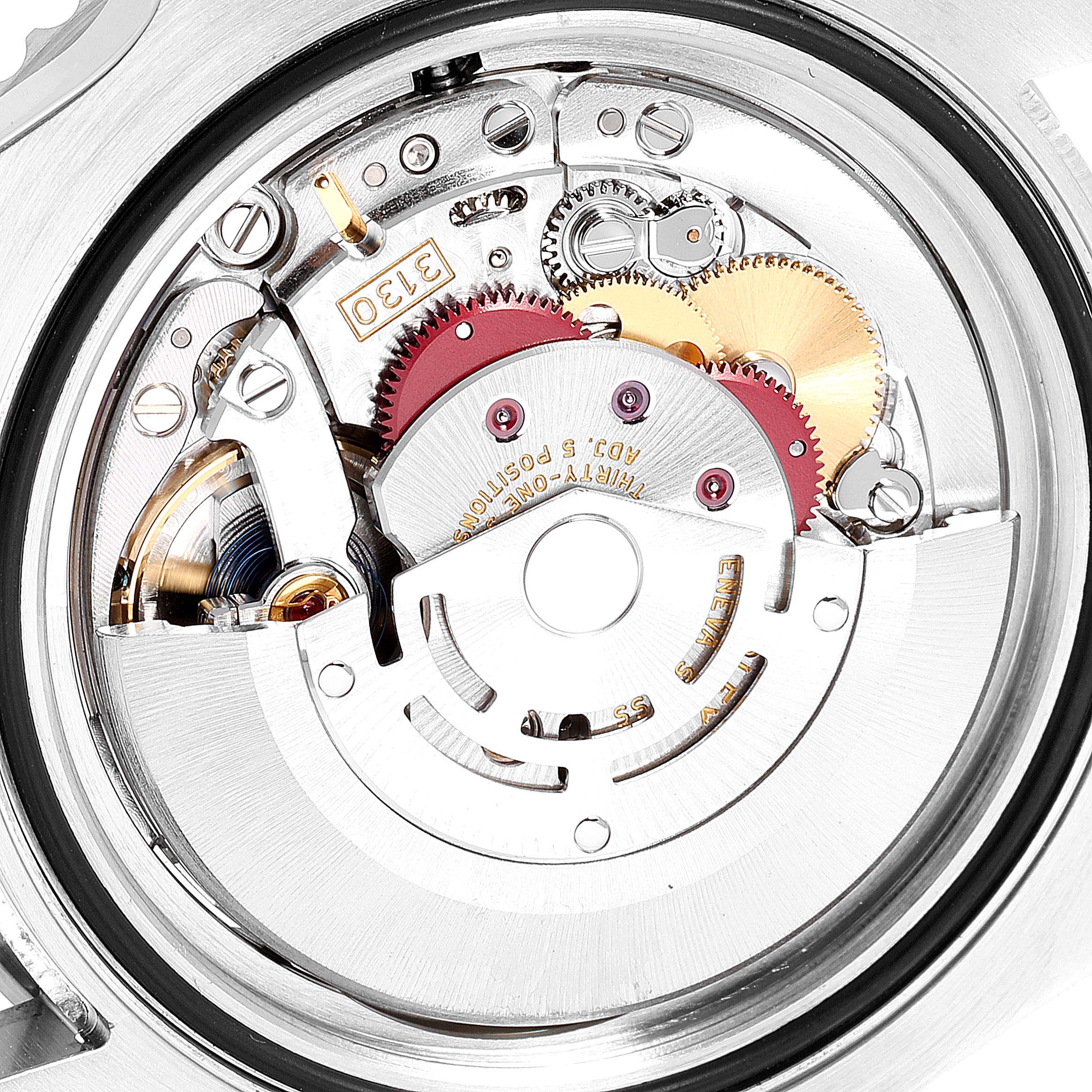 This image shows the intricate internal mechanical movement of a Rolex Submariner 114060 Men
s Stainless Steel Black Dial 114060 Men
s Stainless Steel Black Dial watch from a close-up angle.