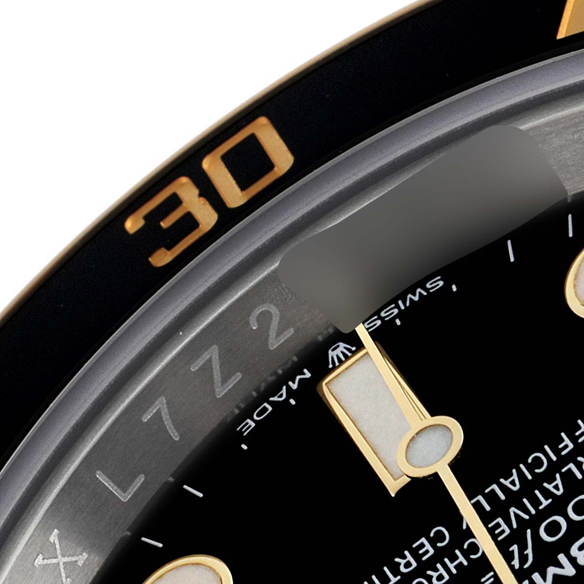 The image shows a close-up of the bezel, part of the dial, and markers of a Rolex Submariner 126613 Men's Steel and Gold (two tone) Black Dial 126613 Men's Steel and Gold (two tone) Black Dial watch.