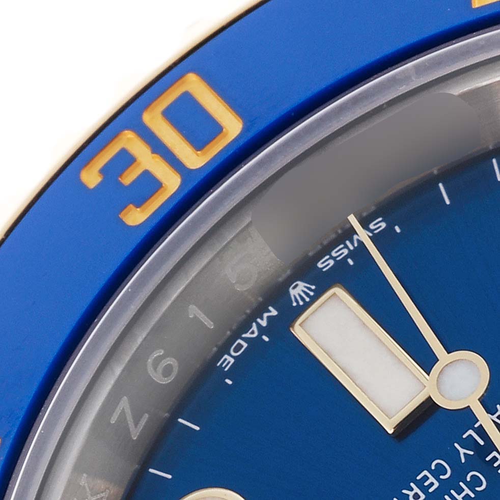 The image shows a close-up of the Rolex Submariner 126613LB Men's Steel and Gold (two tone) Blue Dial 126613LB Men's Steel and Gold (two tone) Blue Dial's blue dial and bezel, highlighting the number "30" and part of the hand.