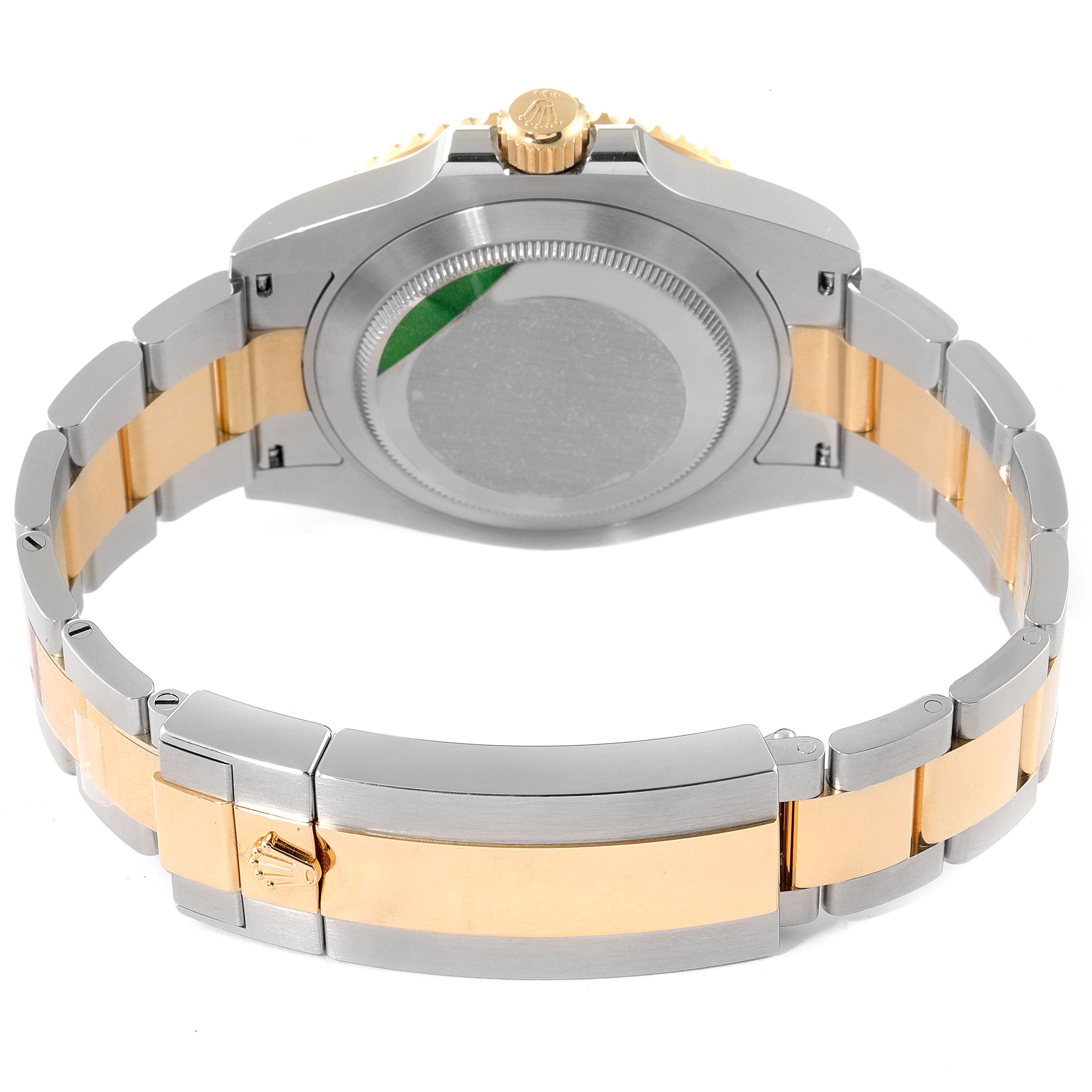 The image shows the backside and bracelet clasp of a Rolex Submariner 126613 Men's Steel and Gold (two tone) Blue Dial 126613 Men's Steel and Gold (two tone) Blue Dial watch, highlighting its two-tone design.