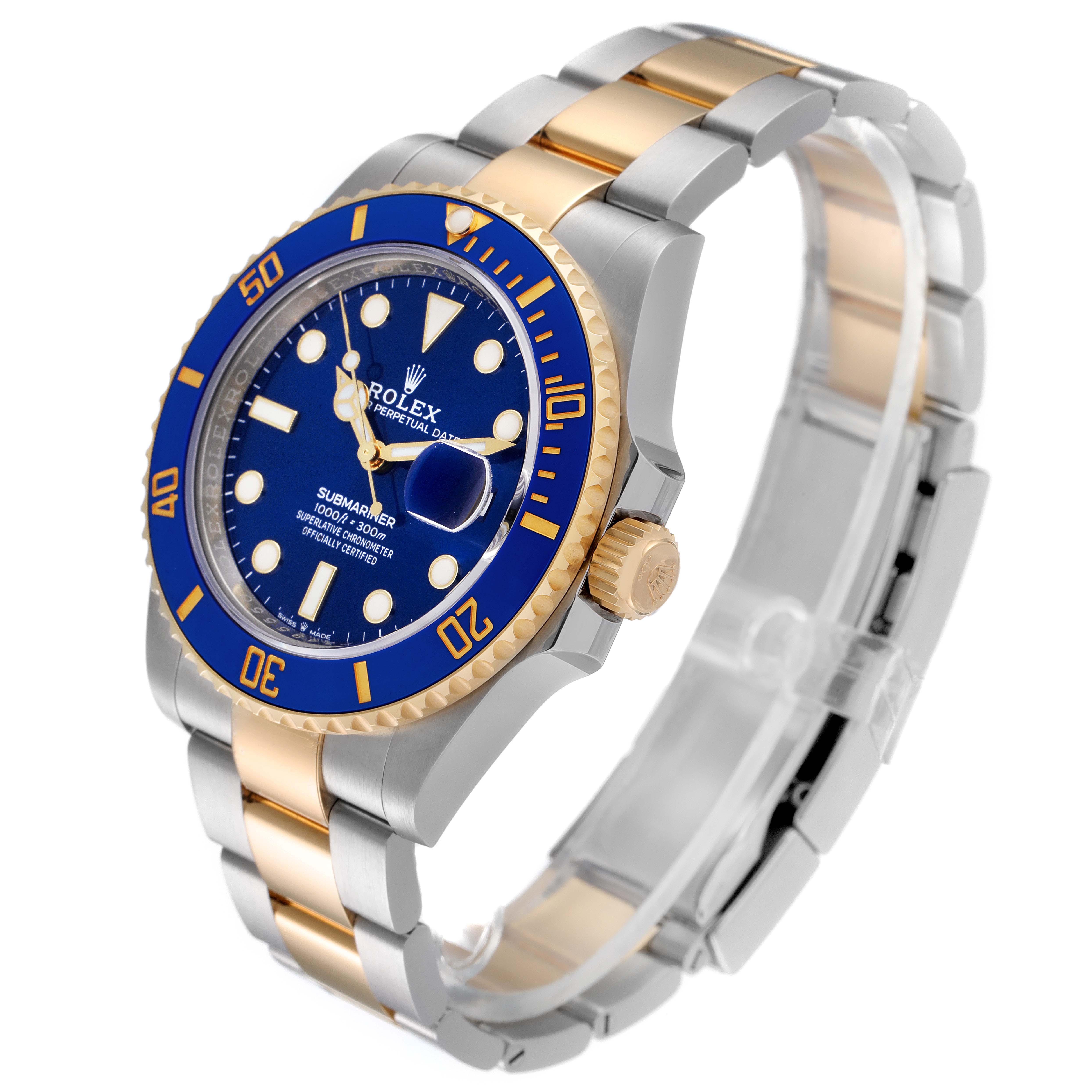 The image shows a Rolex Submariner 126613 Men's Steel and Gold (two tone) Blue Dial 126613 Men's Steel and Gold (two tone) Blue Dial watch at an angle highlighting the dial, bezel, and bracelet.