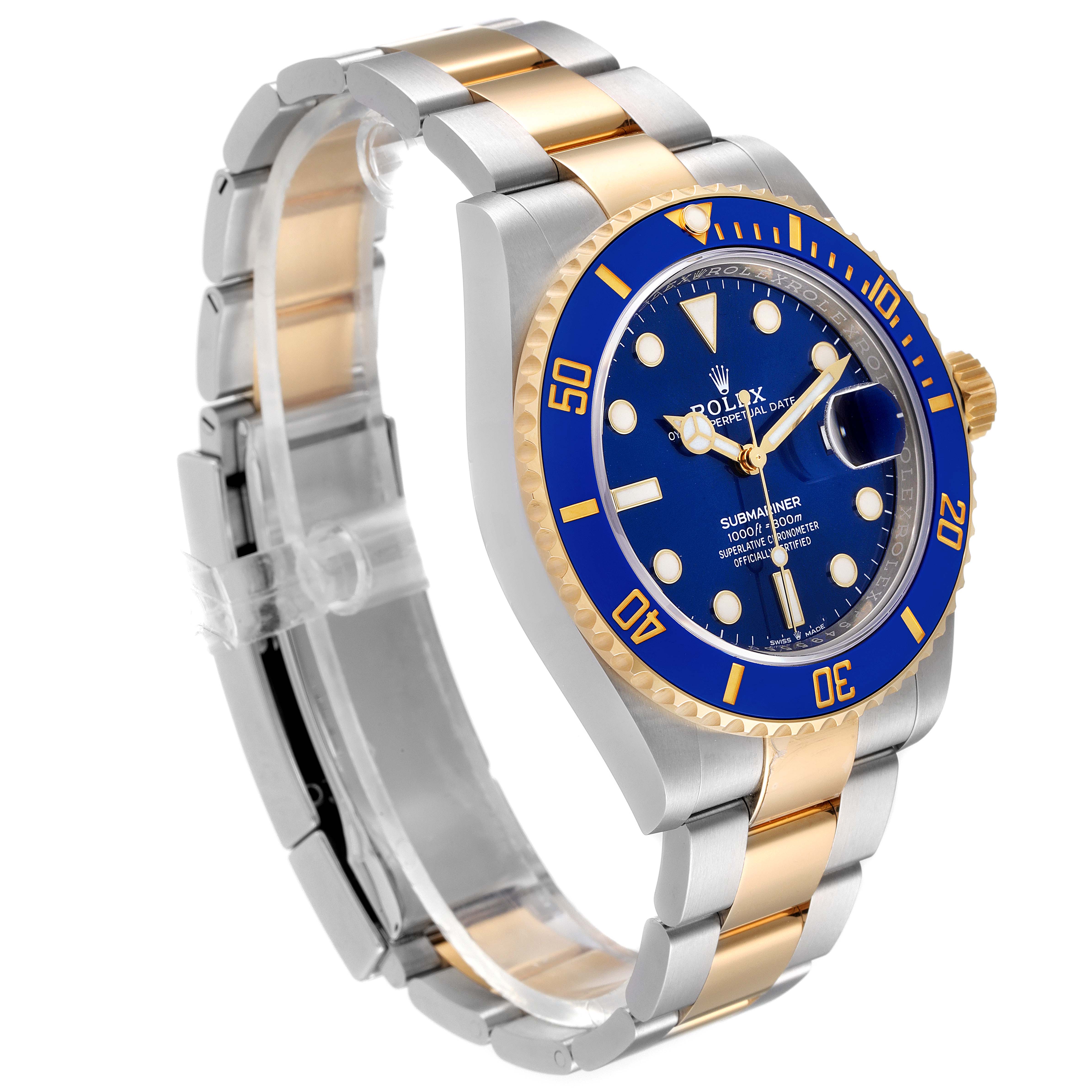 The image shows a Rolex Submariner 126613 Men's Steel and Gold (two tone) Blue Dial 126613 Men's Steel and Gold (two tone) Blue Dial watch at an angle highlighting the blue dial, bezel, two-tone bracelet, and clasp.