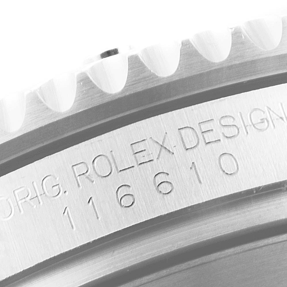 The image shows a close-up of the bezel and case side engraving of a Rolex Submariner 116610LV Men
s Stainless Steel Green Dial 116610LV Men
s Stainless Steel Green Dial model, featuring the model number 116610.