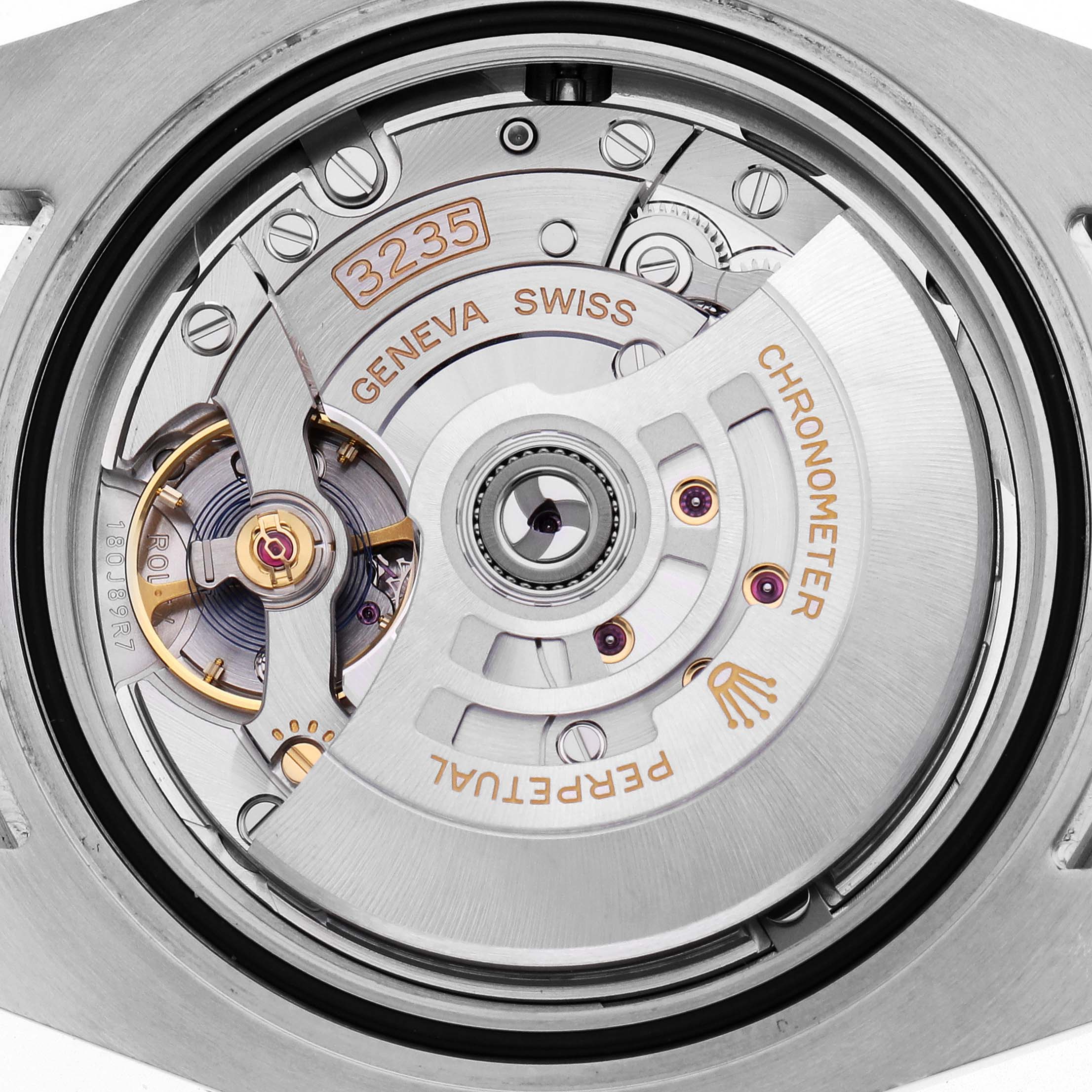 The image shows the movement of a Rolex Submariner 126610LV Men's Stainless Steel Black Dial, highlighting the intricate details of the caliber 3235 mechanism.