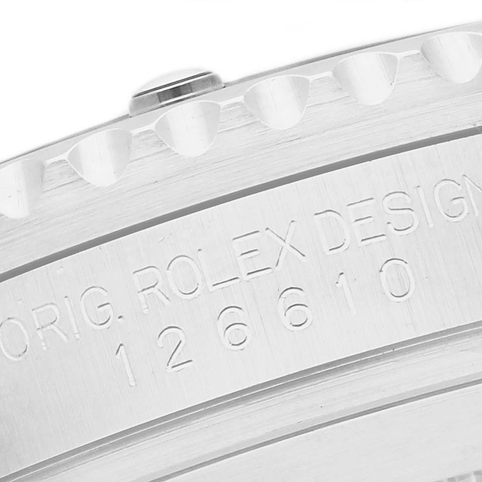 The image shows the side of a Rolex Submariner 126610LV Men's Stainless Steel Black Dial watch case, displaying the engraved model number and part of the bezel edge.