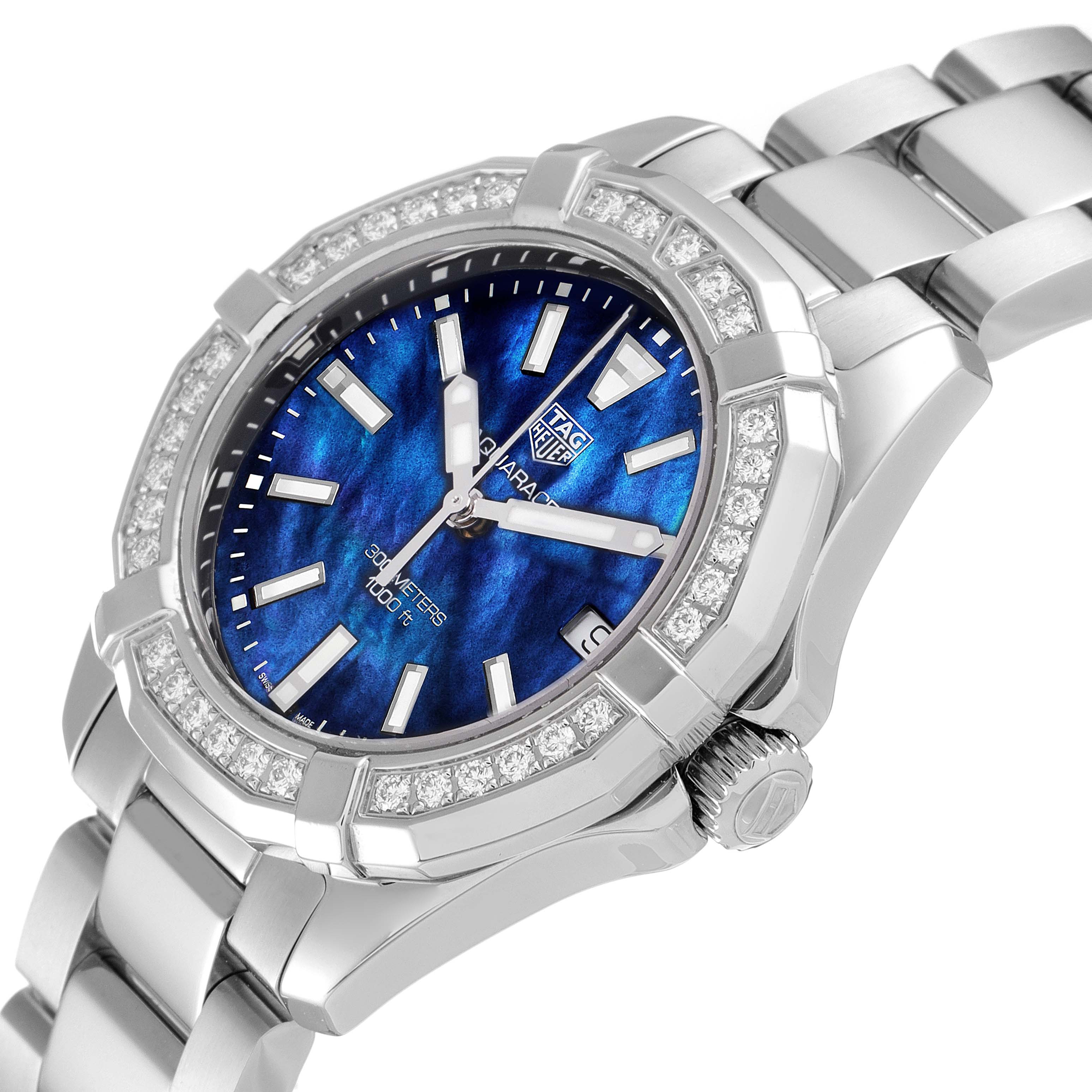 The image shows a close-up, angled view of a Tag Heuer Aquaracer WAY1311 Women's Stainless Steel Mother of Pearl Dial WAY1311 Women's Stainless Steel Mother of Pearl Dial watch, highlighting its bezel, dial, and bracelet.