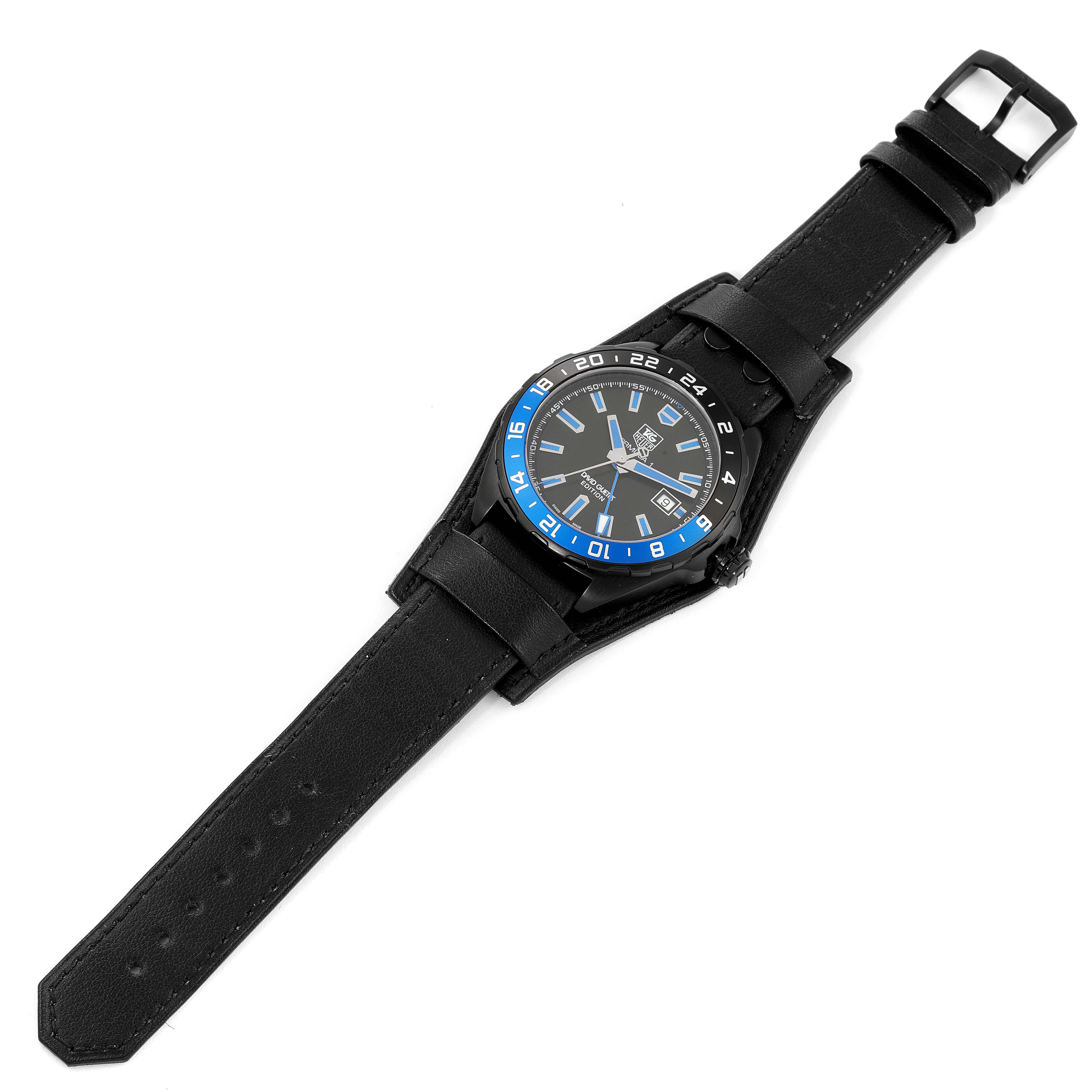 The image shows a top-down view of a Tag Heuer Formula 1 WAZ201A.FC8195 Men's Titanium Black Dial WAZ201A.FC8195 Men's Titanium Black Dial watch with a black strap and a blue and black bezel.