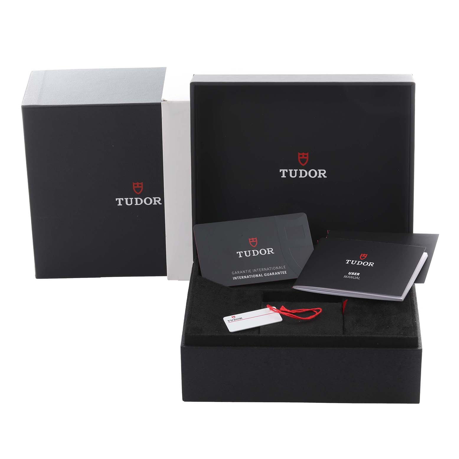 The image shows Tudor Heritage Black Bay M79360N-0019 Men's Stainless Steel Pink Dial M79360N-0019 Men's Stainless Steel Pink Dial packaging, user manual, warranty card, and a tag, without the watch itself.