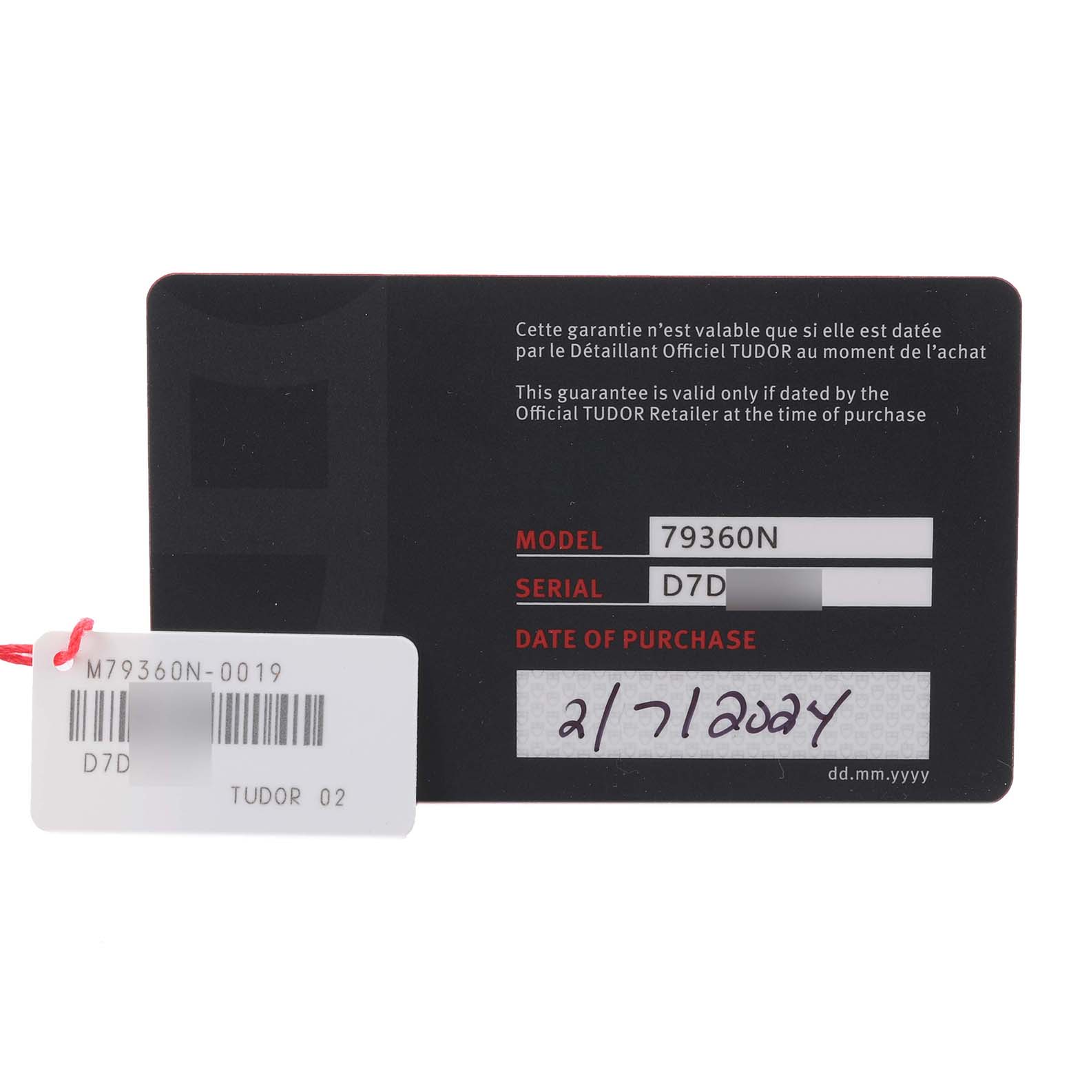 This image shows a warranty card for the Tudor Heritage Black Bay M79360N-0019 Men's Stainless Steel Pink Dial M79360N-0019 Men's Stainless Steel Pink Dial model 79360N, with model and serial numbers visible.