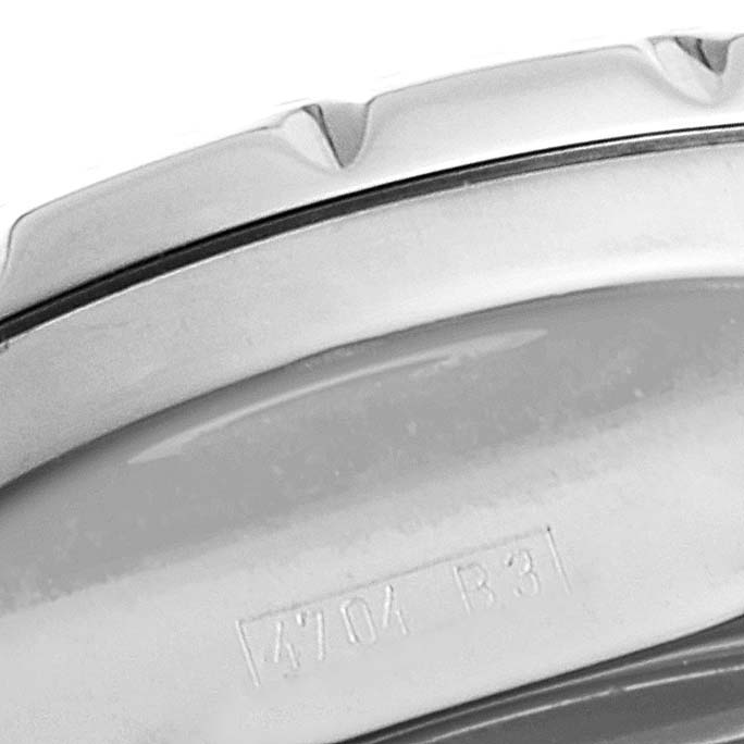 The image shows a close-up view of the bezel and part of the case back of a Breitling Bentley A25362 Men's Stainless Steel Blue Dial A25362 Men's Stainless Steel Blue Dial model watch.