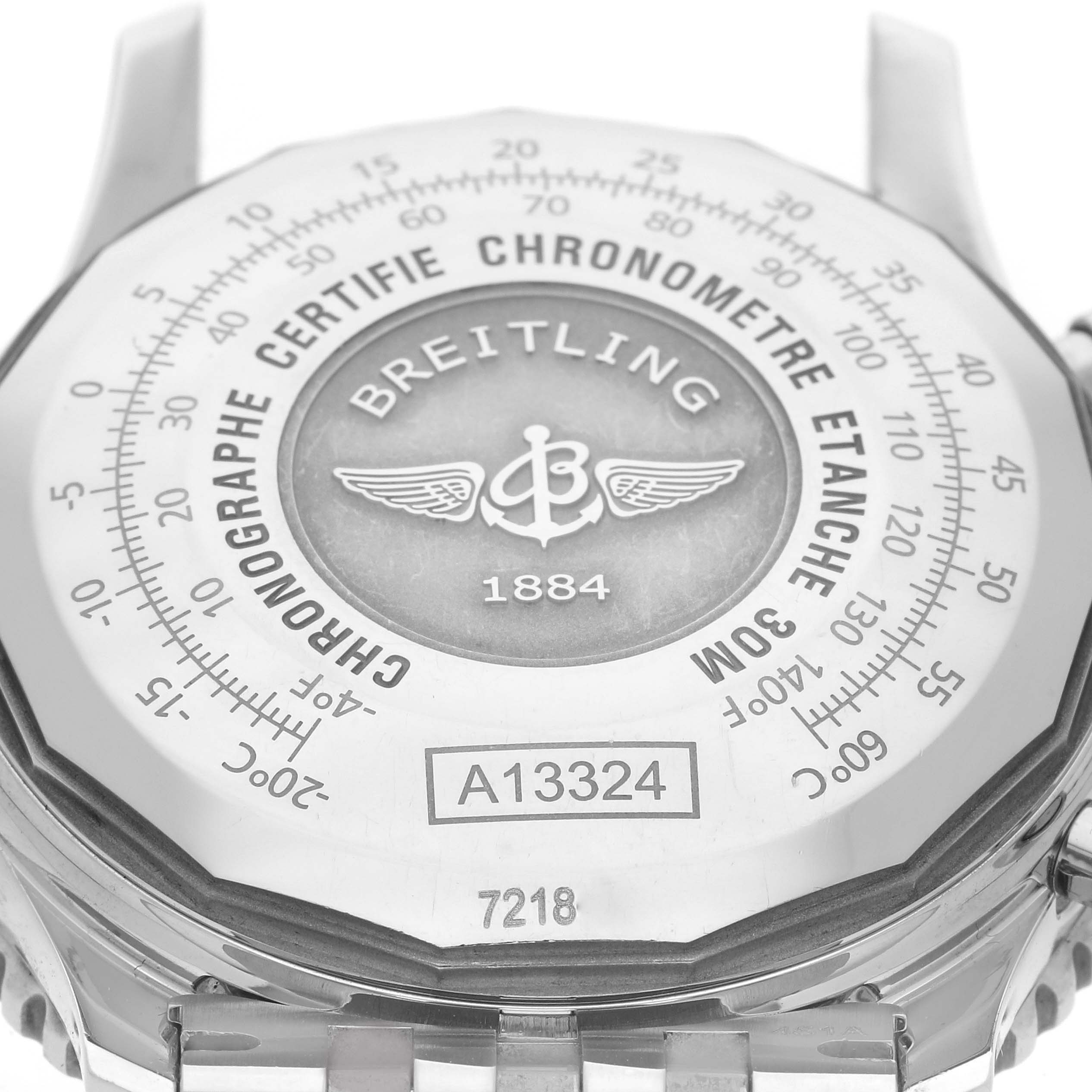 The image shows the back of a Breitling Navitimer A13324 Men
s Stainless Steel Blue Dial A13324 Men
s Stainless Steel Blue Dial watch, highlighting the engraved logo and model details.