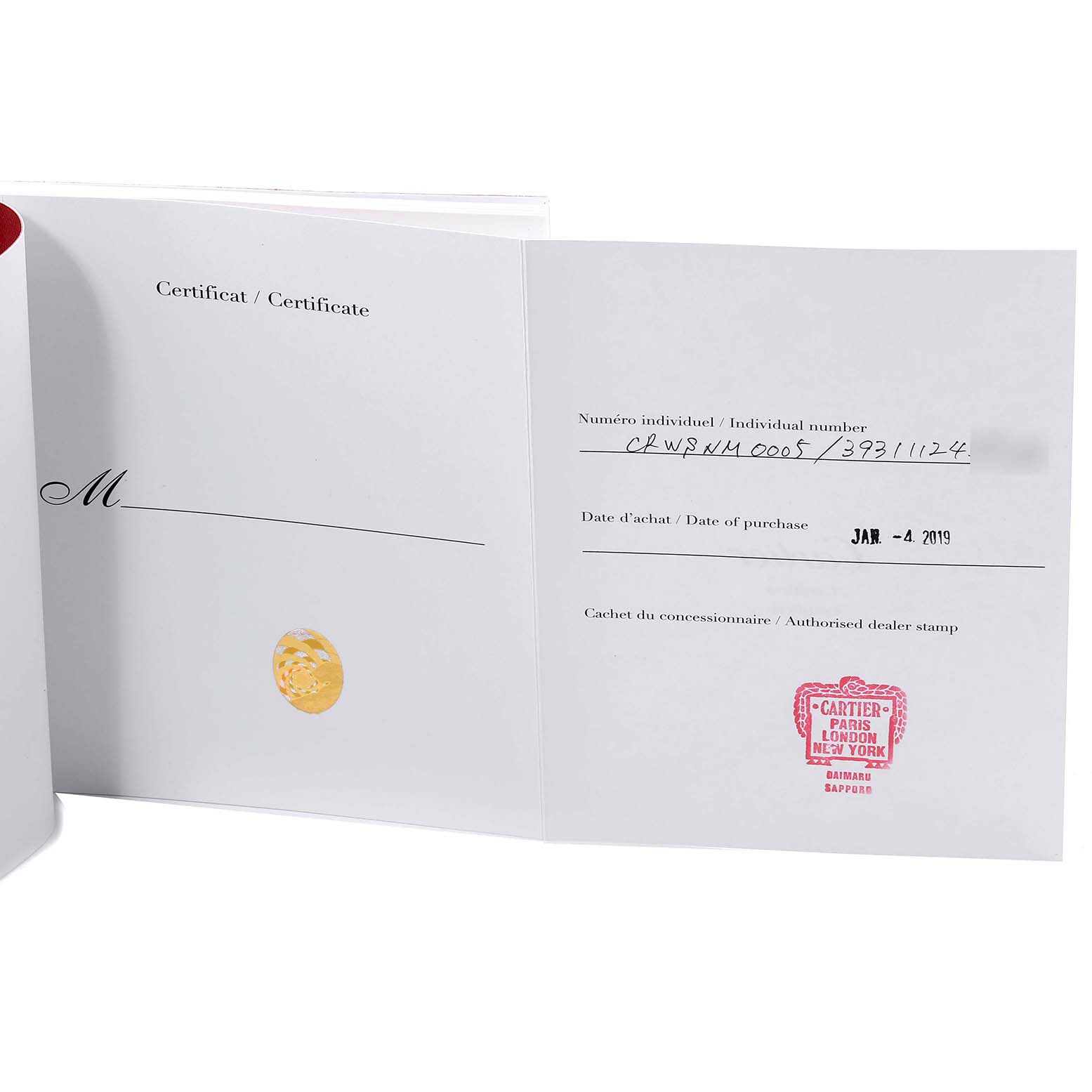 The image shows the certification card for the Drive de Cartier watch by Cartier, including the individual number and dealer stamp.