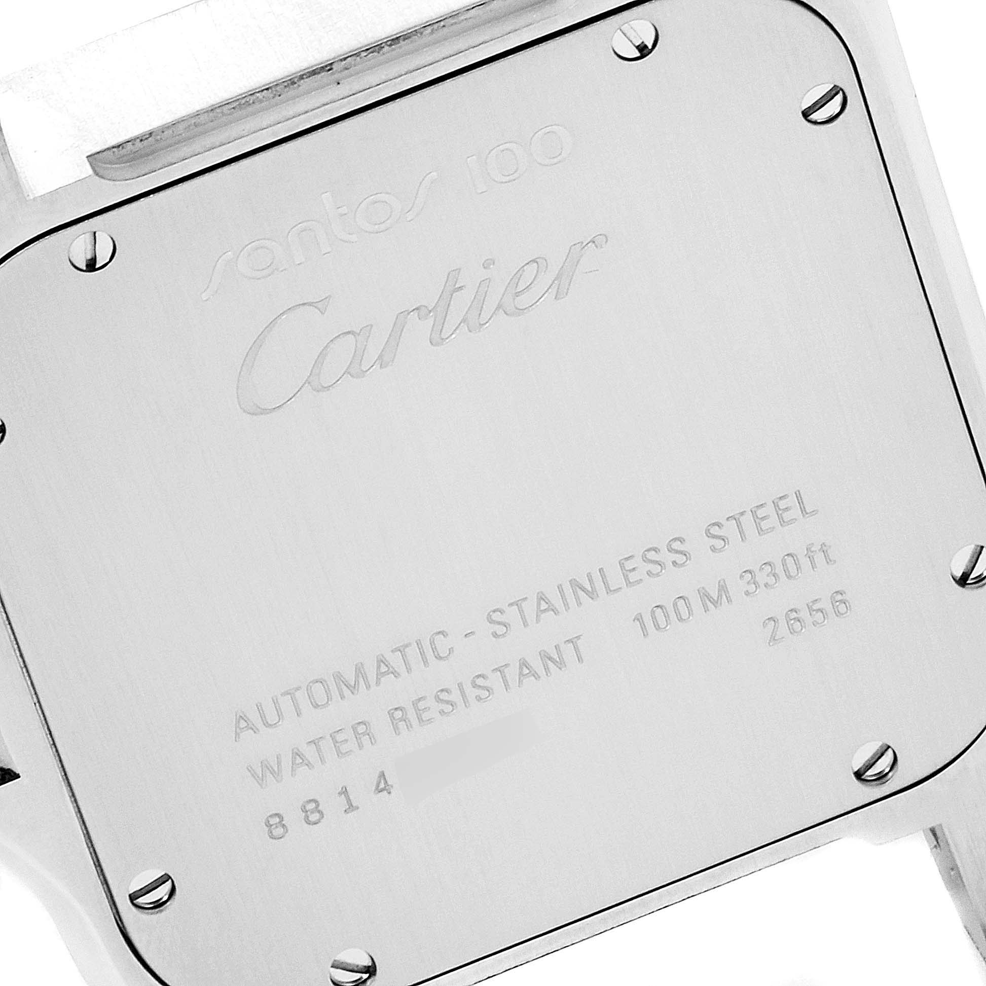 This image shows the back case of the Cartier Santos W20073X8 Men
s Stainless Steel Silver Dial W20073X8 Men
s Stainless Steel Silver Dial 100 watch, including engravings and screws.