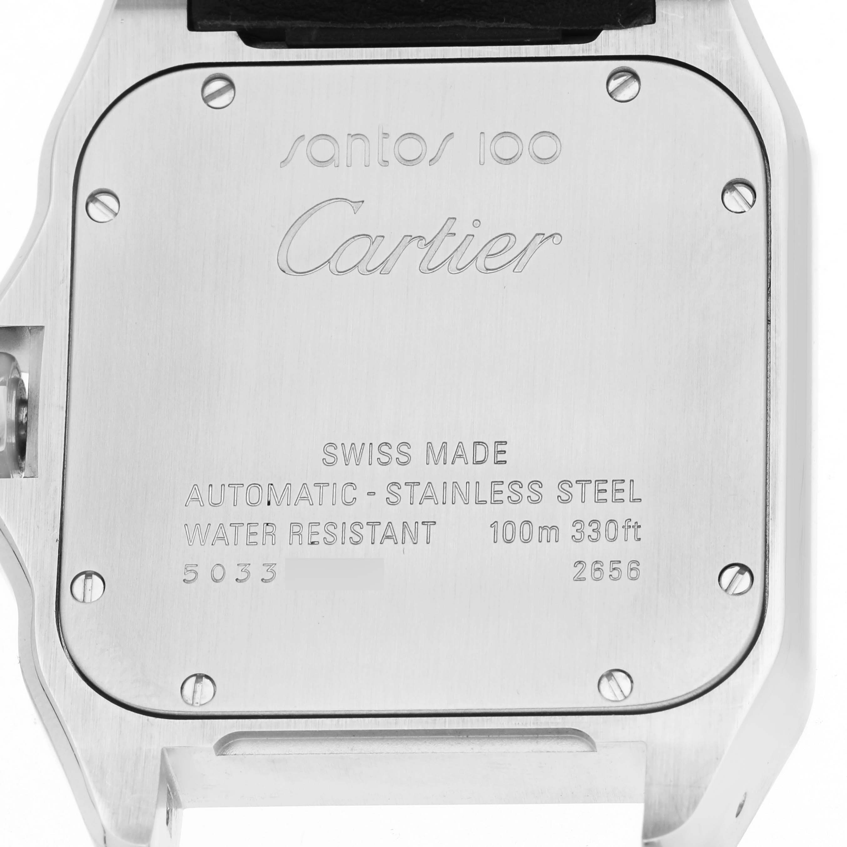 The image shows the case back of the Cartier Santos W20073X8 Men's Stainless Steel Silver Dial model, highlighting engraved details and screws.