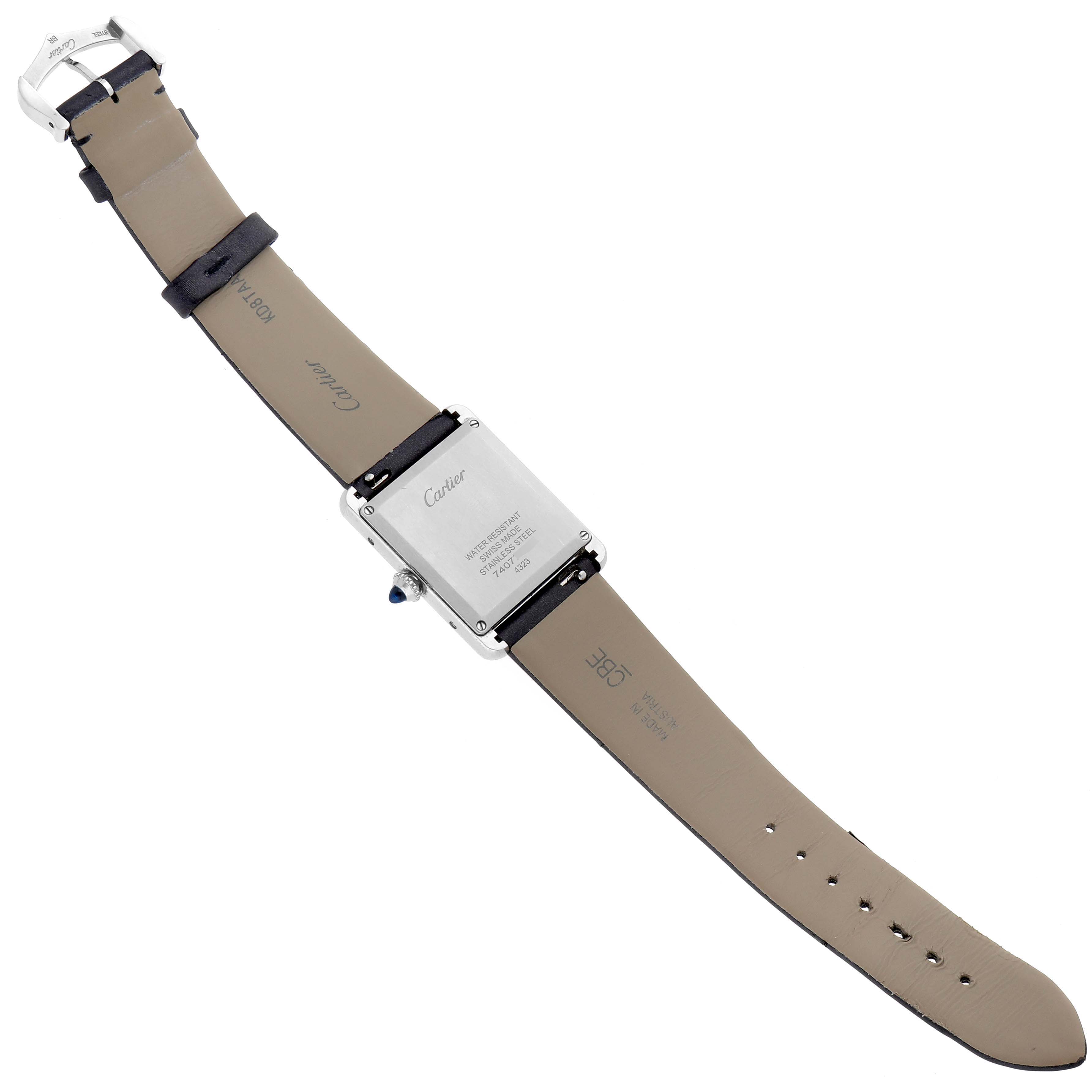 The Cartier Tank Must W4TA0017 Women
s Stainless Steel Silver Dial W4TA0017 Women
s Stainless Steel Silver Dial watch is shown from the back, displaying the case, strap, and buckle.