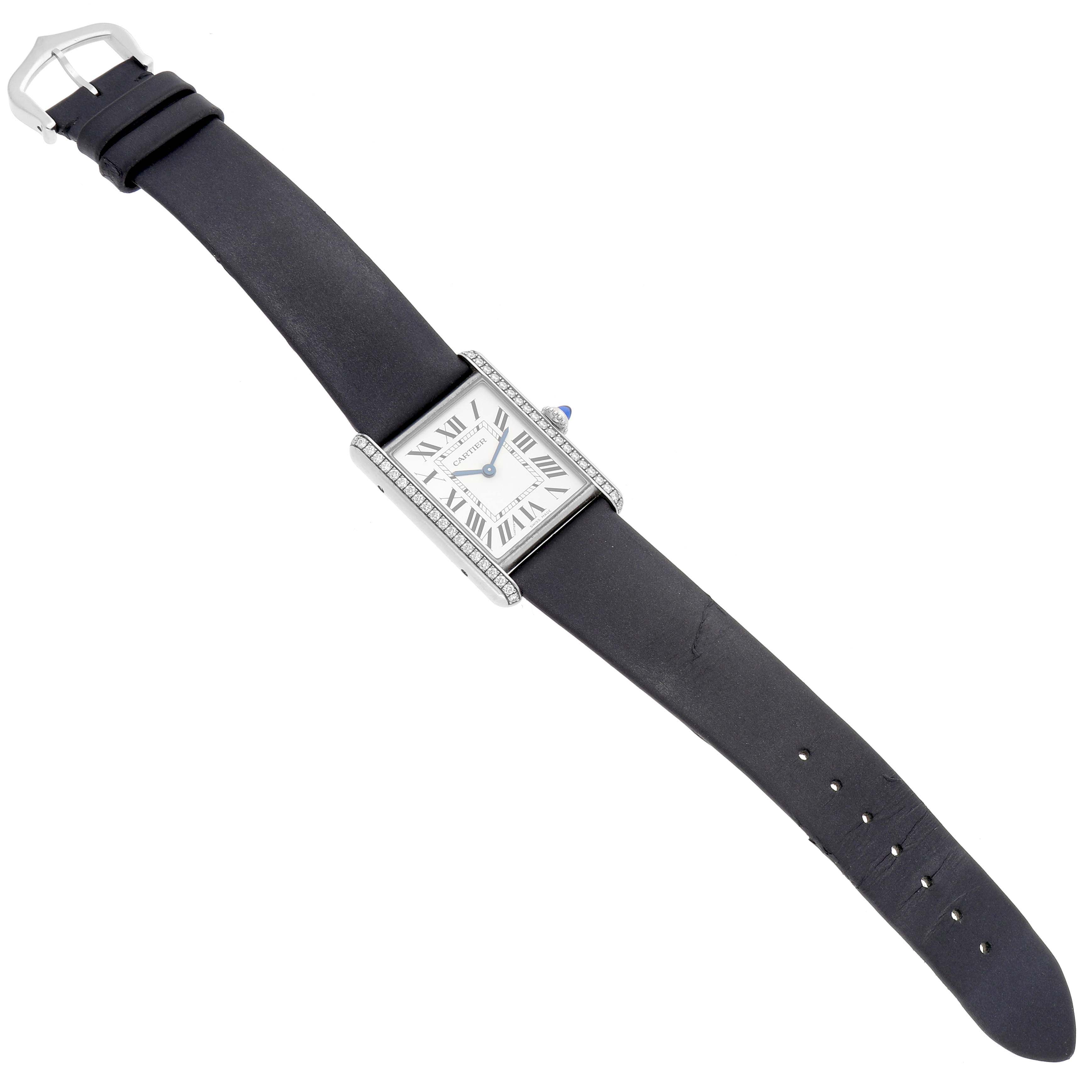 The Cartier Tank Must W4TA0017 Women
s Stainless Steel Silver Dial W4TA0017 Women
s Stainless Steel Silver Dial watch is shown from a top view, displaying the face, bezel, and entire leather strap.