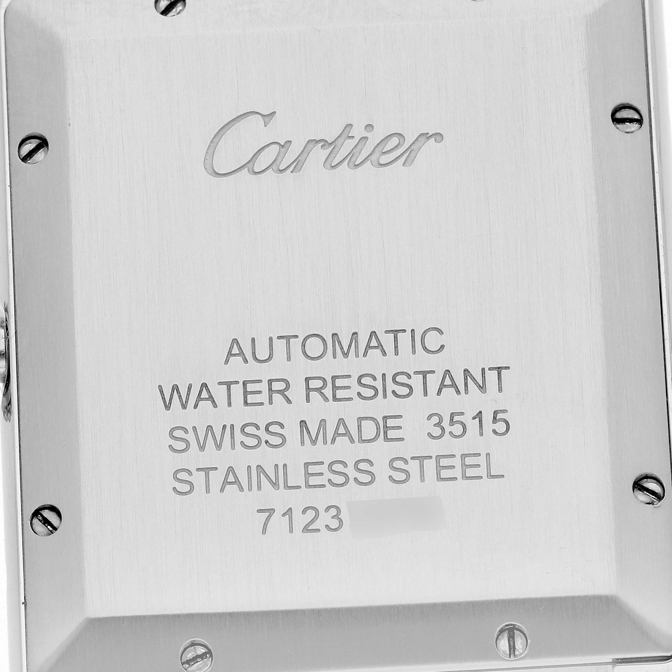 The image shows the back case of a Cartier Tank Solo W5200027 Men's Stainless Steel Silver Dial W5200027 Men's Stainless Steel Silver Dial watch, highlighting its stainless steel material and inscriptions.