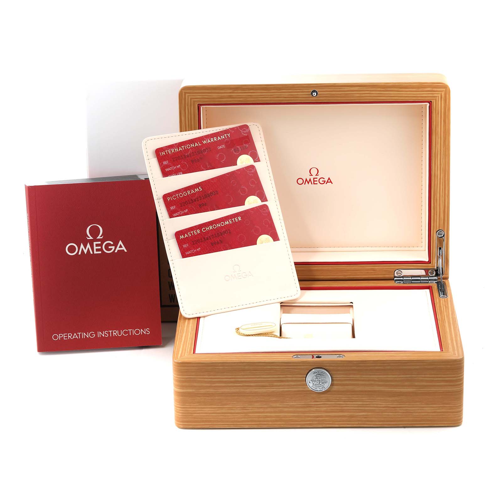 This image shows the packaging, warranty cards, and operating instructions for the Omega Aqua Terra 220.13.41.21.03.002 Men's Stainless Steel Blue Dial 220.13.41.21.03.002 Men's Stainless Steel Blue Dial watch.