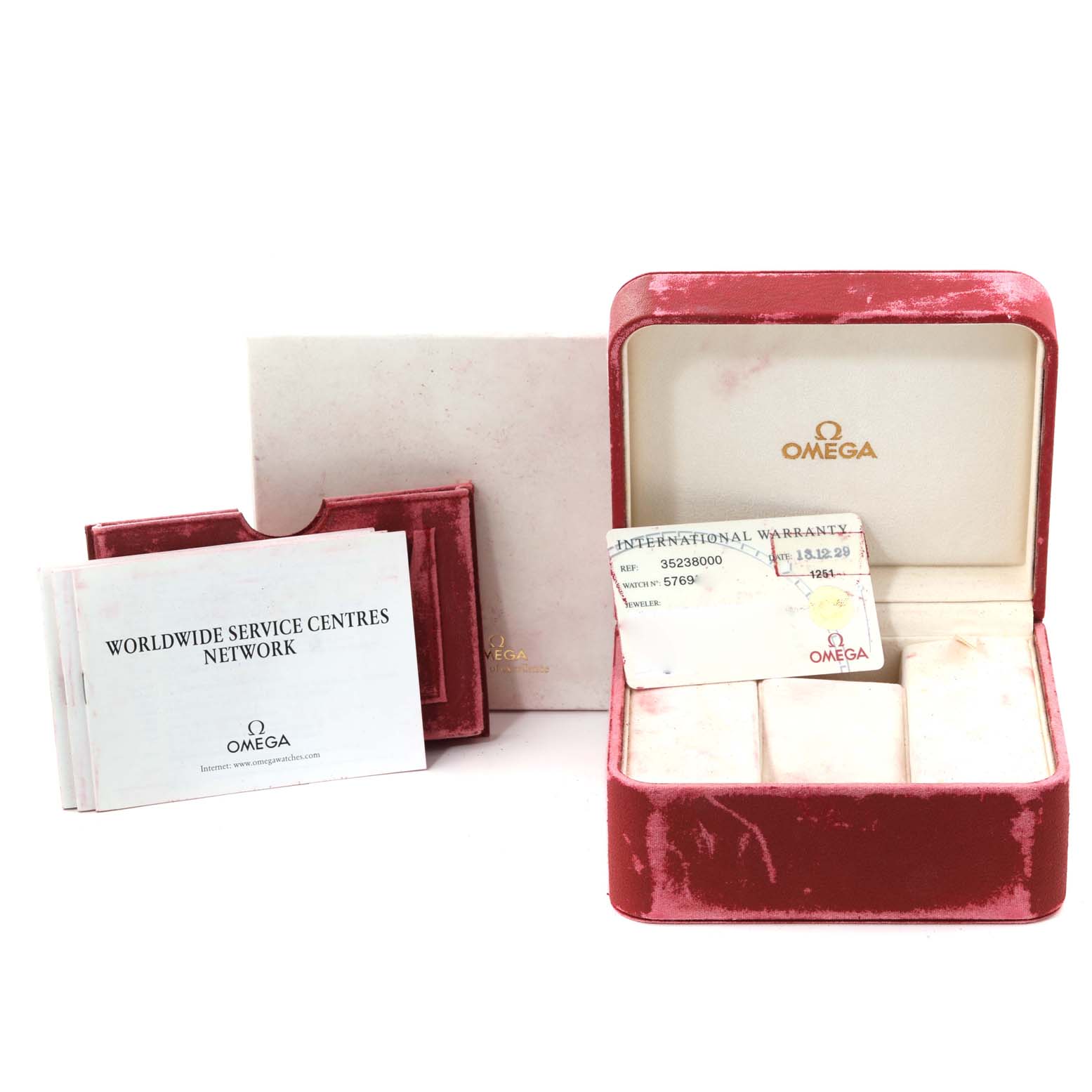 The image shows an Omega Speedmaster 3523.80.00 Men
s Stainless Steel Blue Dial 3523.80.00 Men
s Stainless Steel Blue Dial watch box and accessories, including warranty cards and a service booklet.