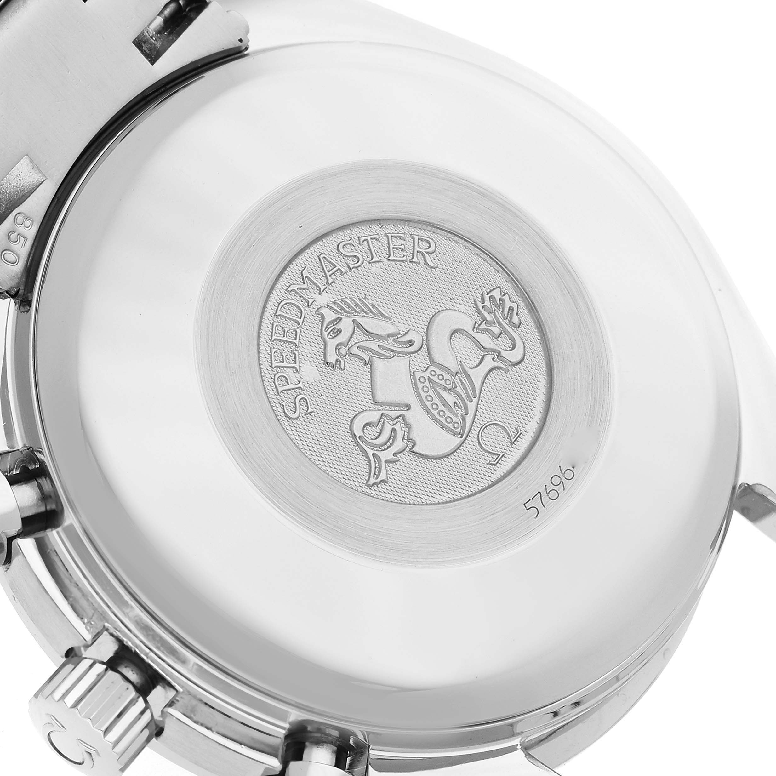 This is a close-up angle showing the back case of the Omega Speedmaster 3523.80.00 Men
s Stainless Steel Blue Dial 3523.80.00 Men
s Stainless Steel Blue Dial watch, featuring its logo and engravings.