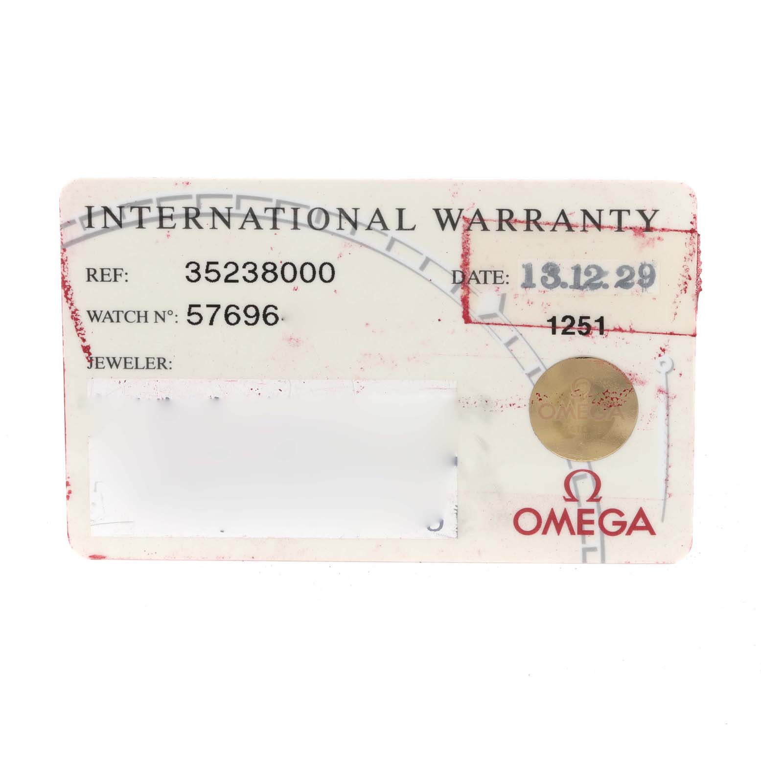 This image shows the International Warranty card for the Omega Speedmaster 3523.80.00 Men
s Stainless Steel Blue Dial 3523.80.00 Men
s Stainless Steel Blue Dial watch model.
