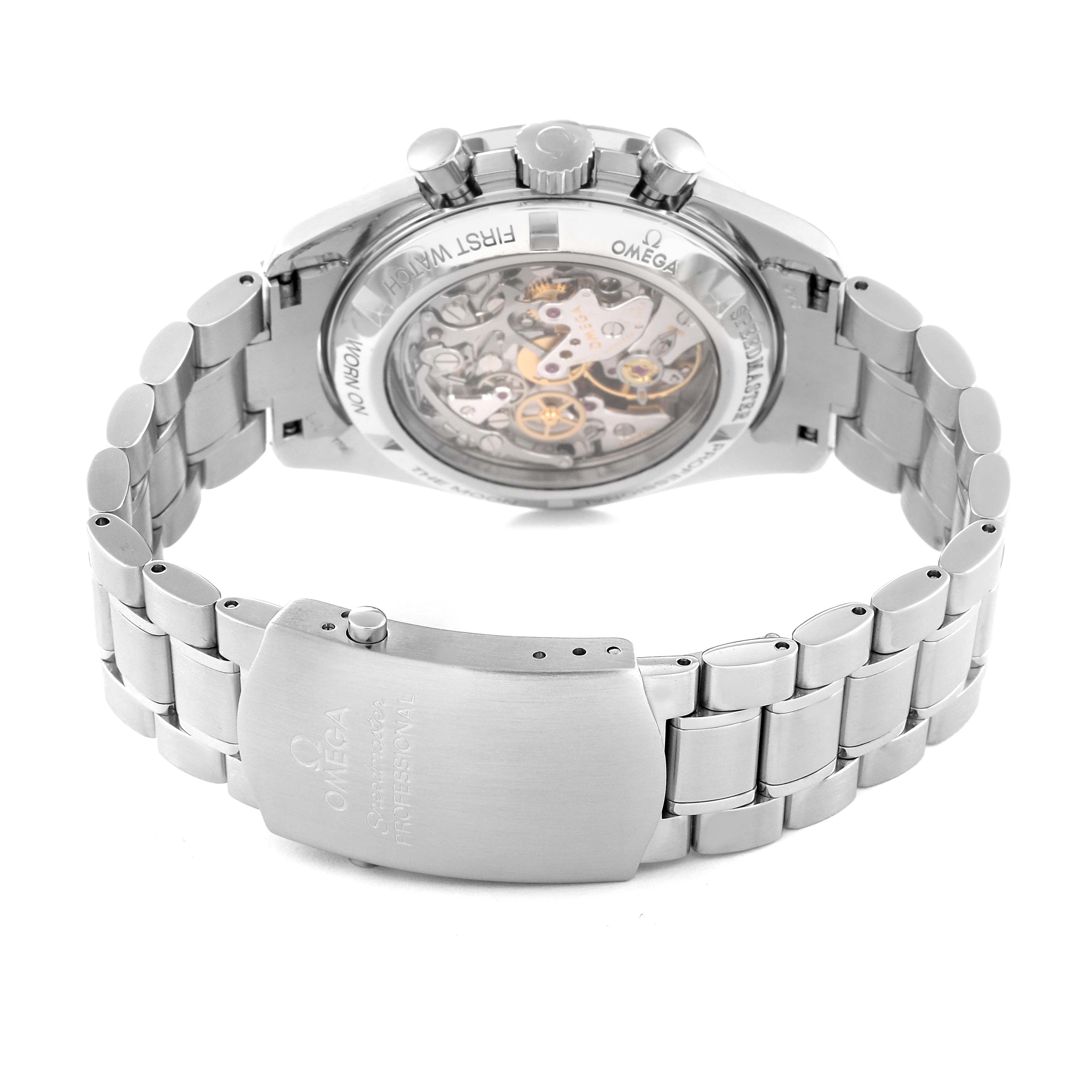 The image shows the back view of an Omega Speedmaster 3572.50.00 Men
s Stainless Steel Black Dial 3572.50.00 Men
s Stainless Steel Black Dial watch, highlighting its open caseback and stainless steel bracelet.