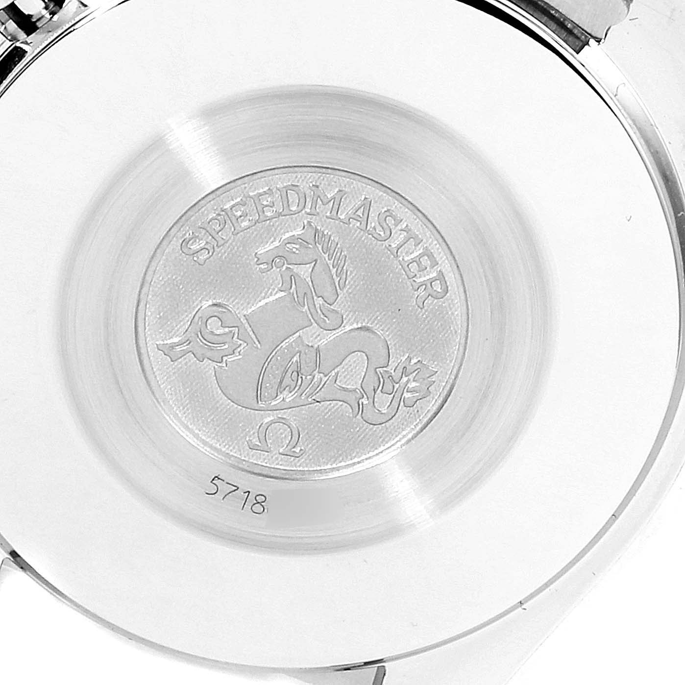 This is the case back of an Omega Speedmaster 3510.50.00 Men's Stainless Steel Black Dial 3510.50.00 Men's Stainless Steel Black Dial watch, showing the engraved logo and model number.