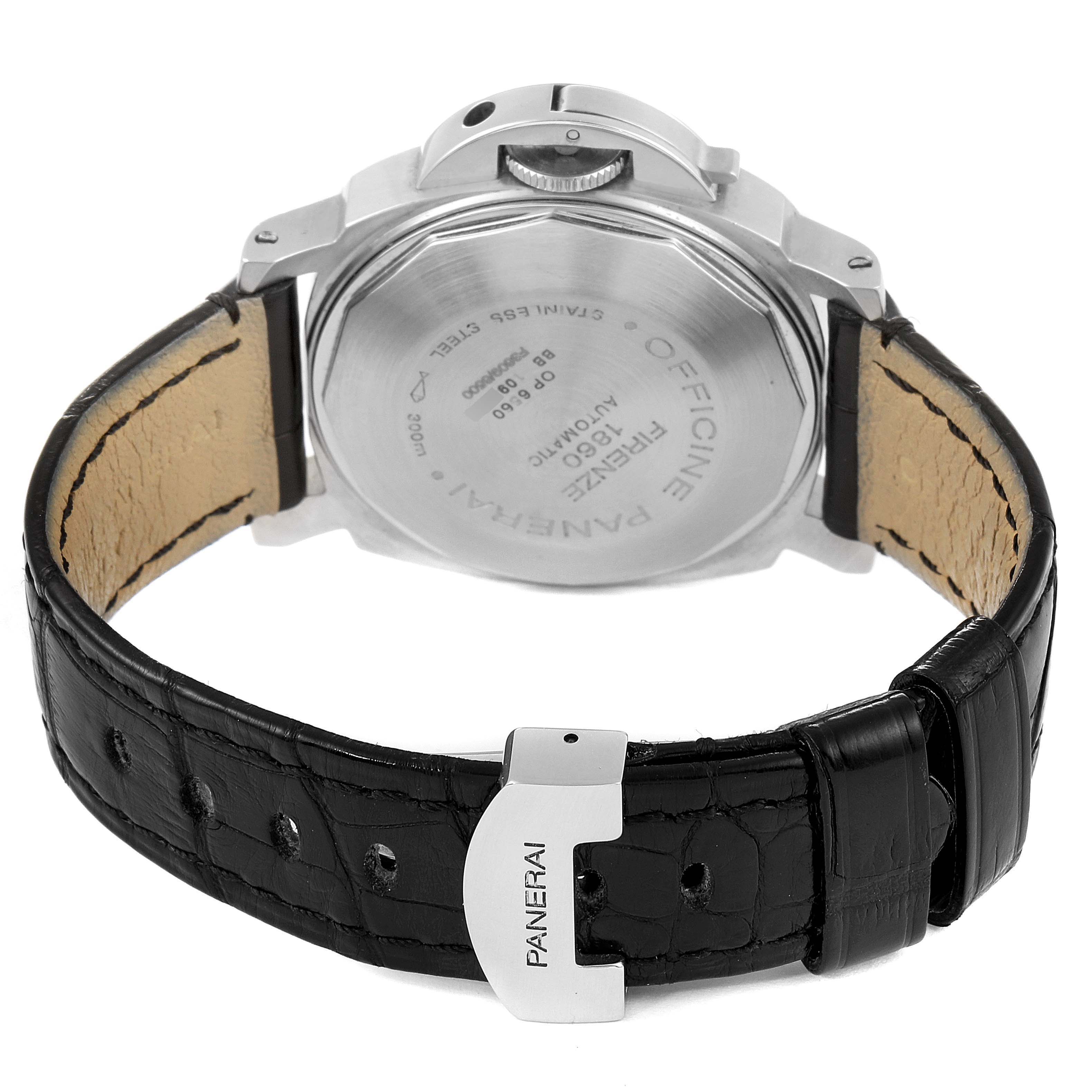 This image shows the back case, crown, and part of the leather strap of a Panerai Luminor PAM00049 Men
s Stainless Steel White Dial PAM00049 Men
s Stainless Steel White Dial watch.