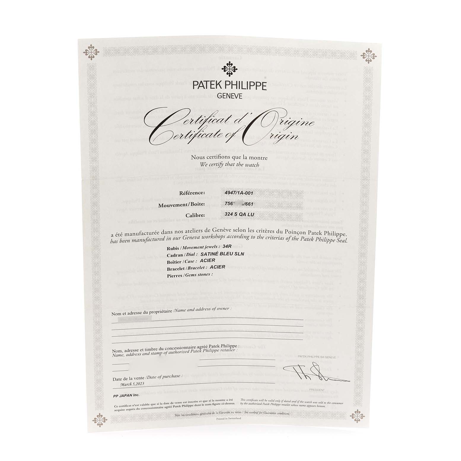 The image shows a Certificate of Origin for the Patek Philippe Complications 4947/1A-001 Men's Stainless Steel Blue Dial 4947/1A-001 Men's Stainless Steel Blue Dial model, oriented vertically.